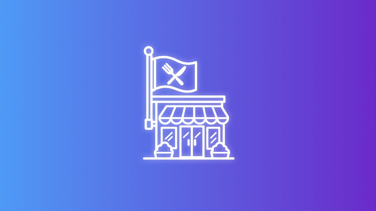 Restaurant storefront with a standard flag displaying a fork and knife icon.