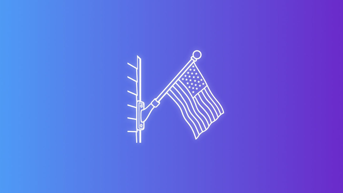 White outline icon of a house-mounted flagpole bracket holding an angled American flag