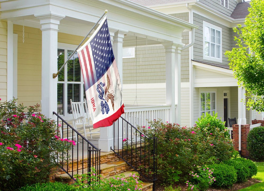 a flag on a porch of a house