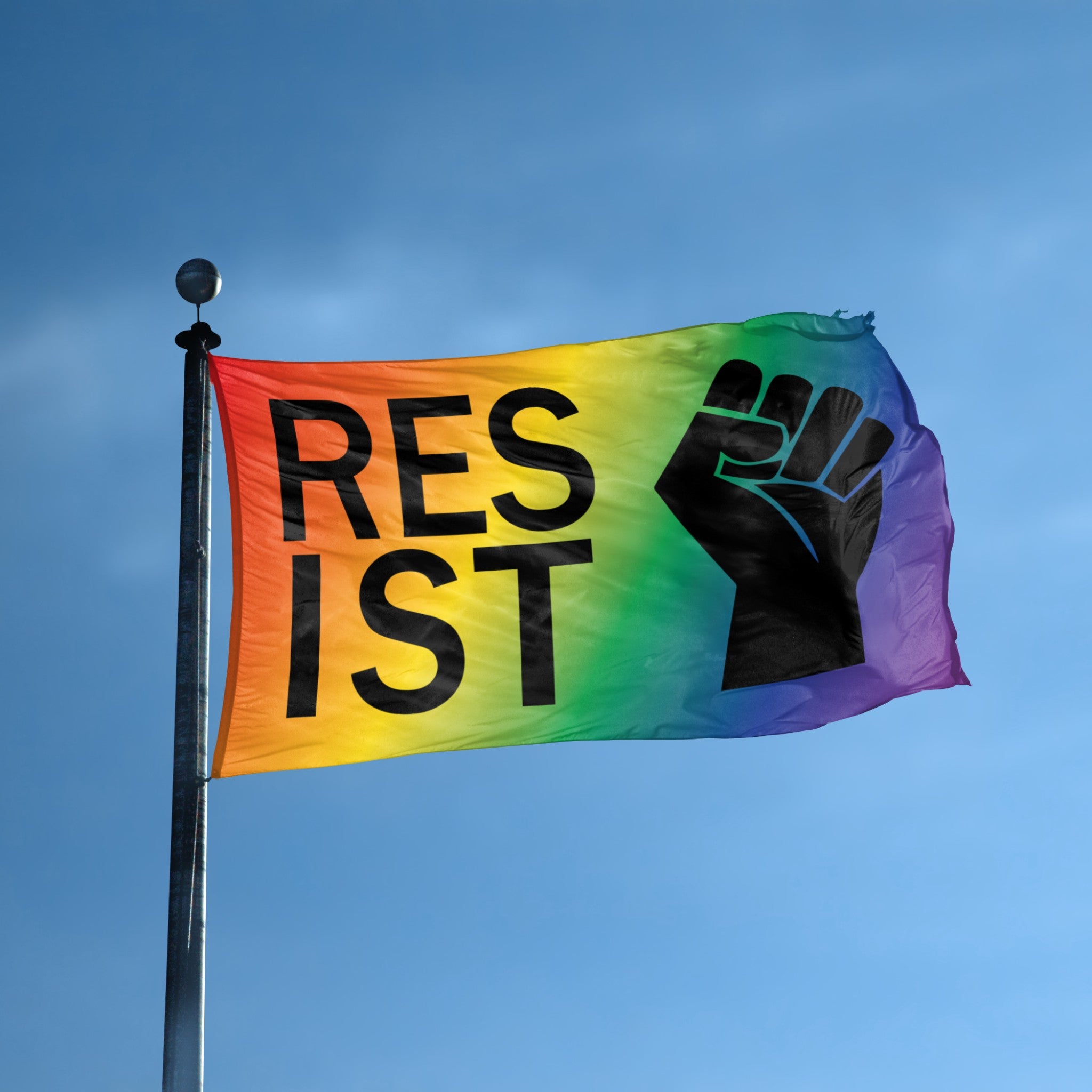 Rainbow flag with 'RESIST' and a black fist against a blue sky