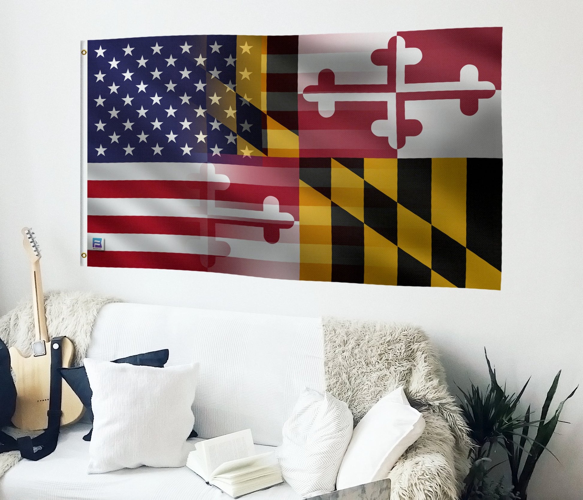 a living room with a white couch and a flag on the wall