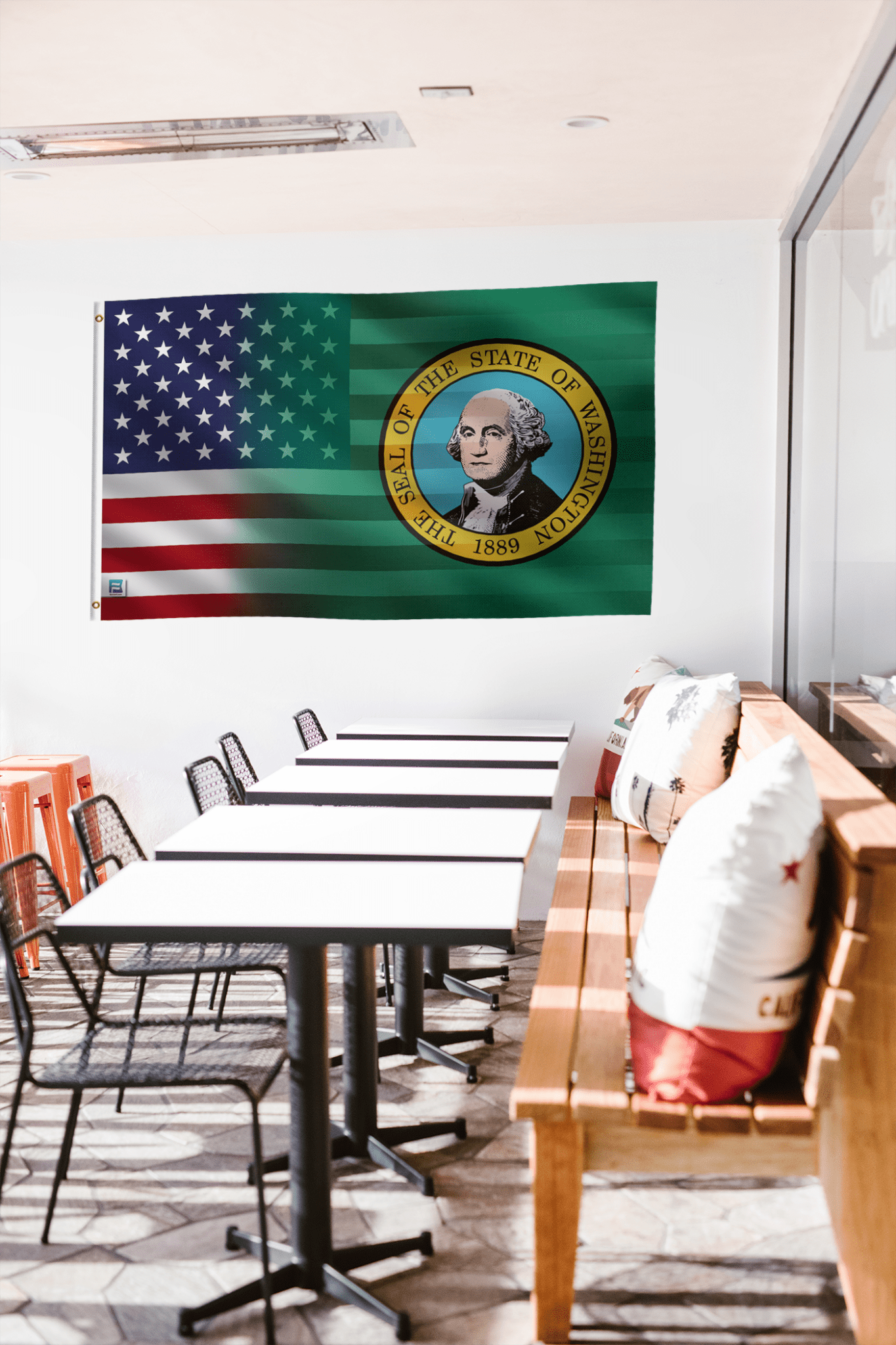 a room with tables and chairs and a flag hanging on the wall