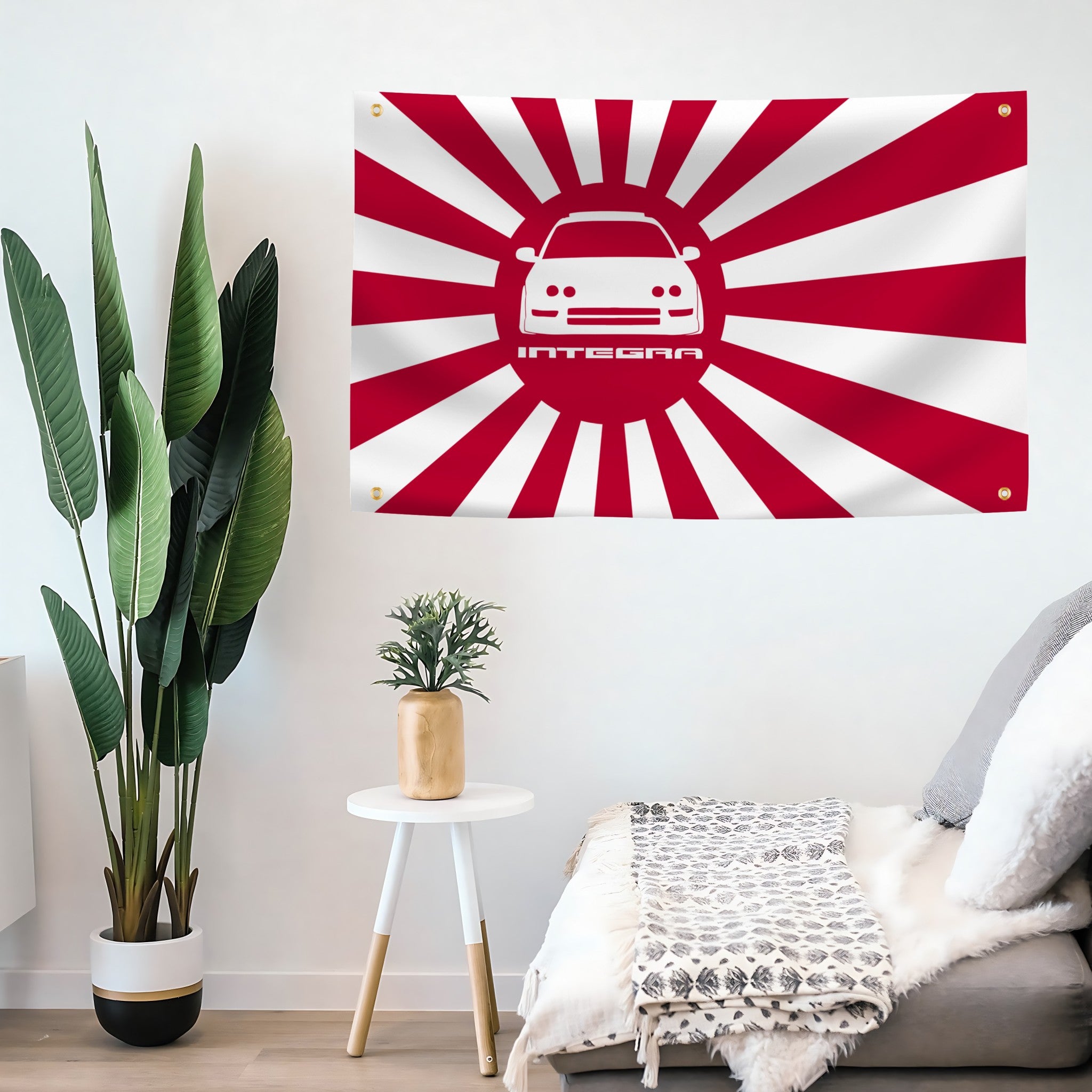 Red and white flag with an integra car design hanging on a wall above a living room.