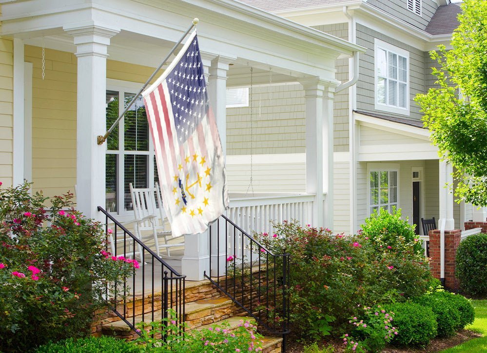 an american flag on a porch of a house