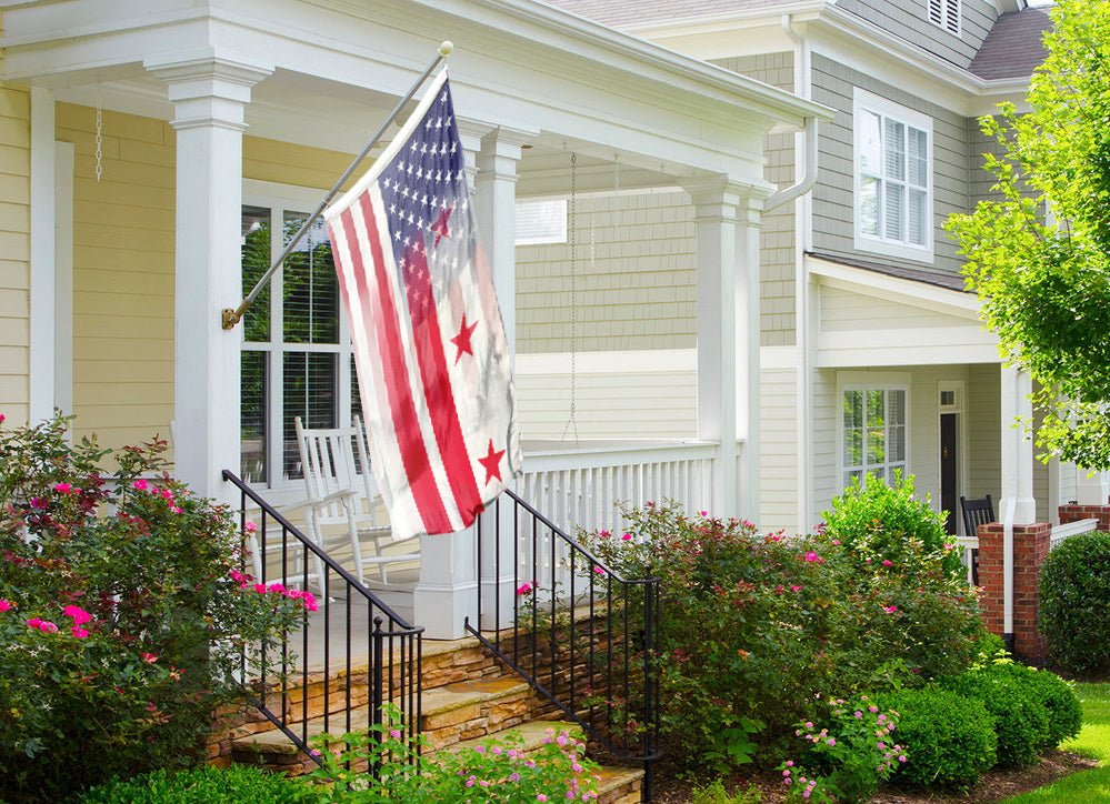 an american flag on a porch of a house