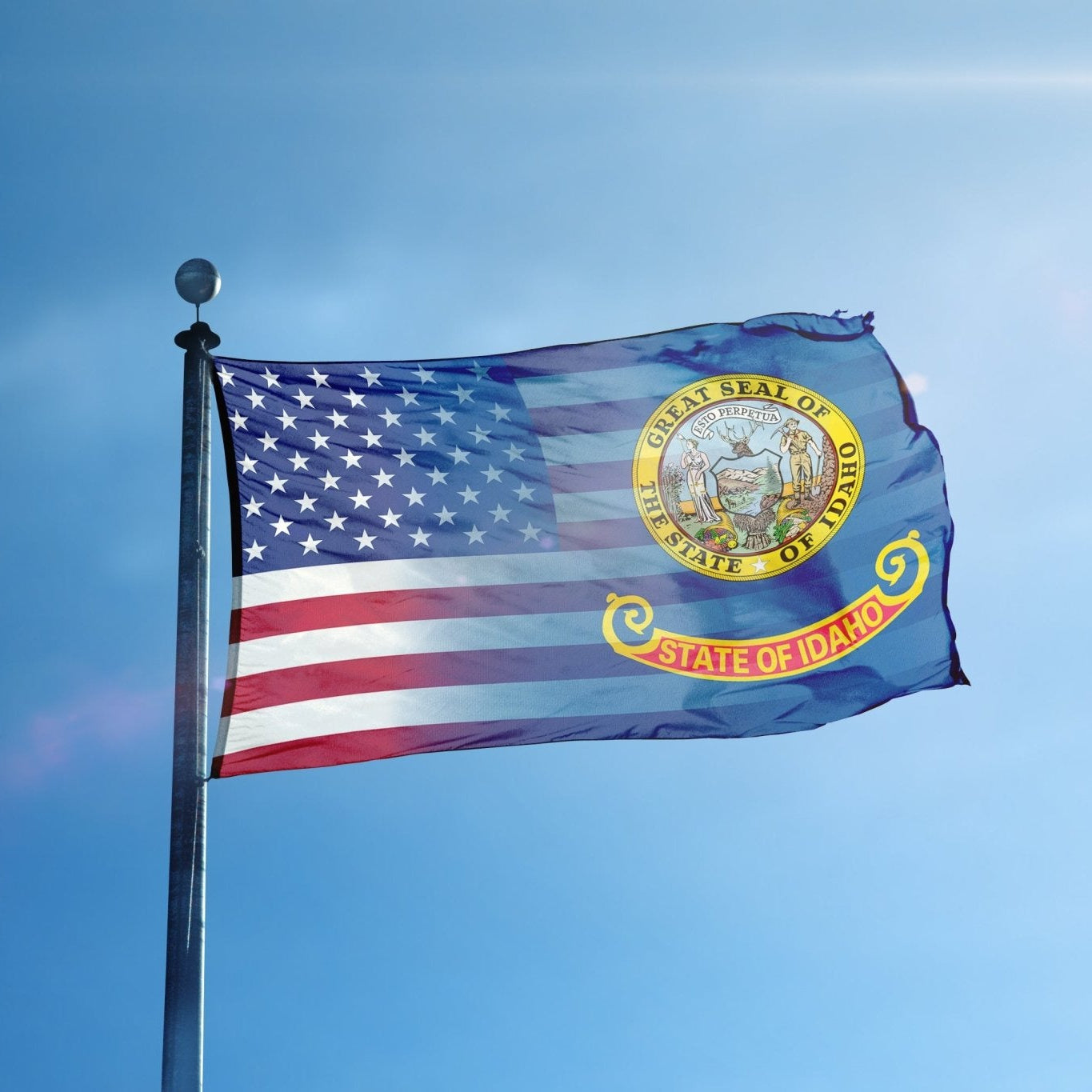 the state of idaho flag blended with the stars and stripes of the american flag on a flag pole