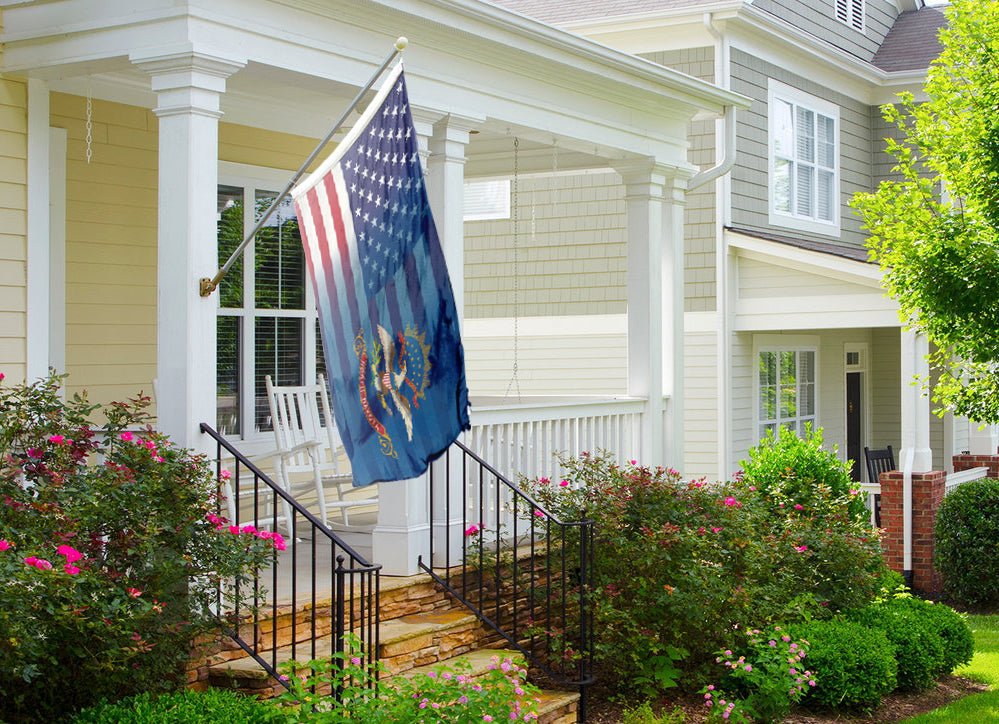 an american flag on a porch of a house