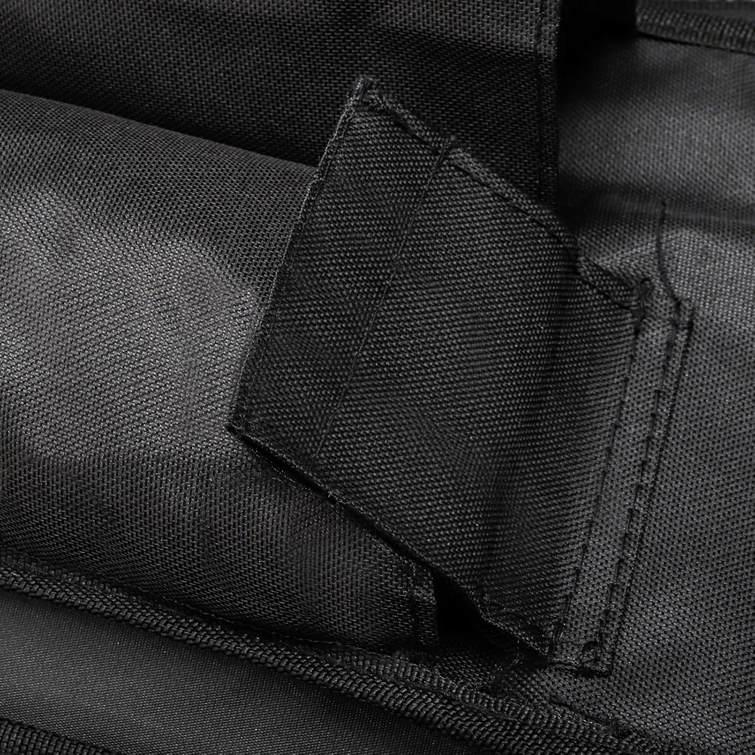 Close-up of a black feather flag carrying bag compartment with stitching detail