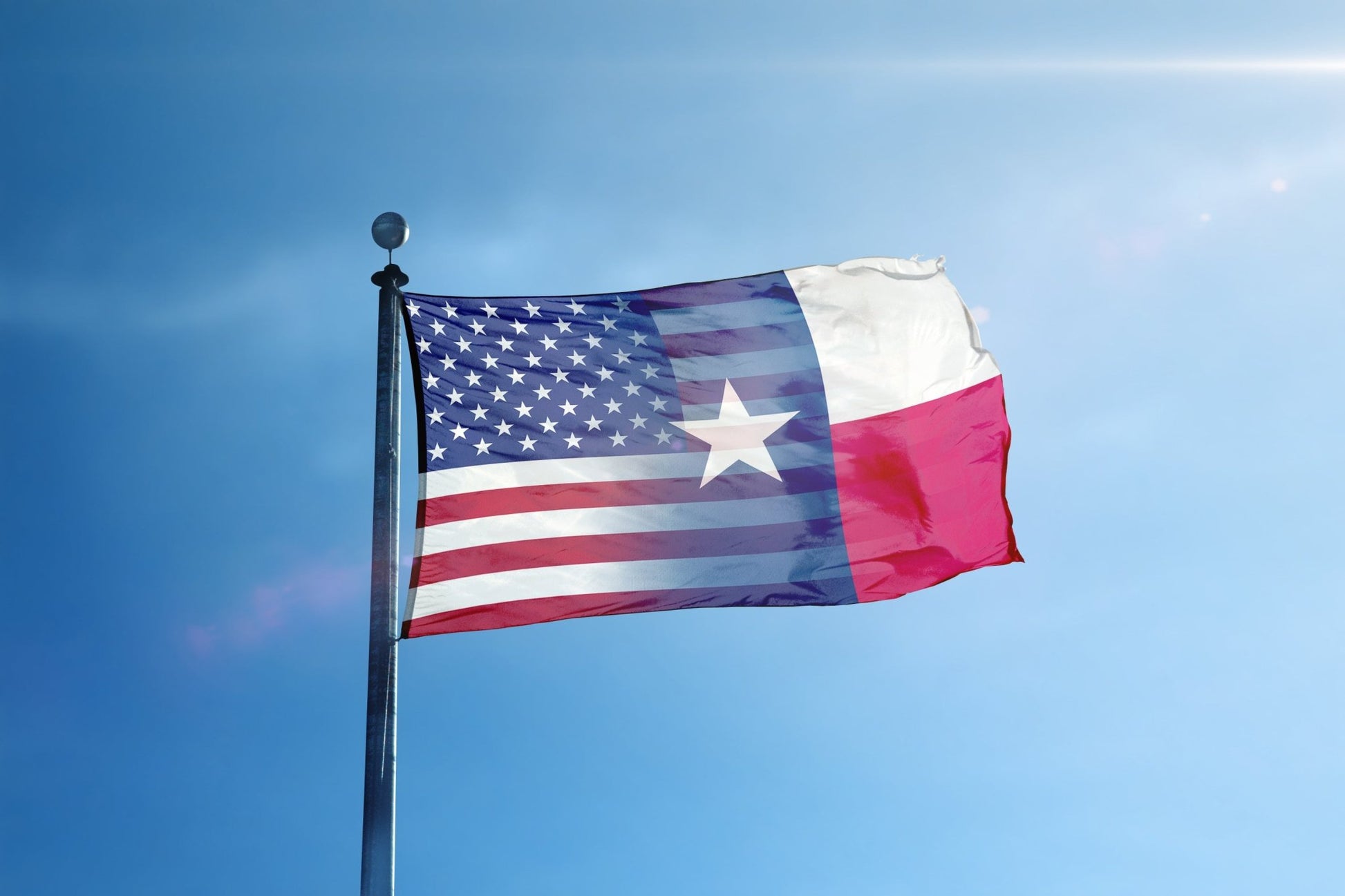 a flag flying in the wind on a sunny day