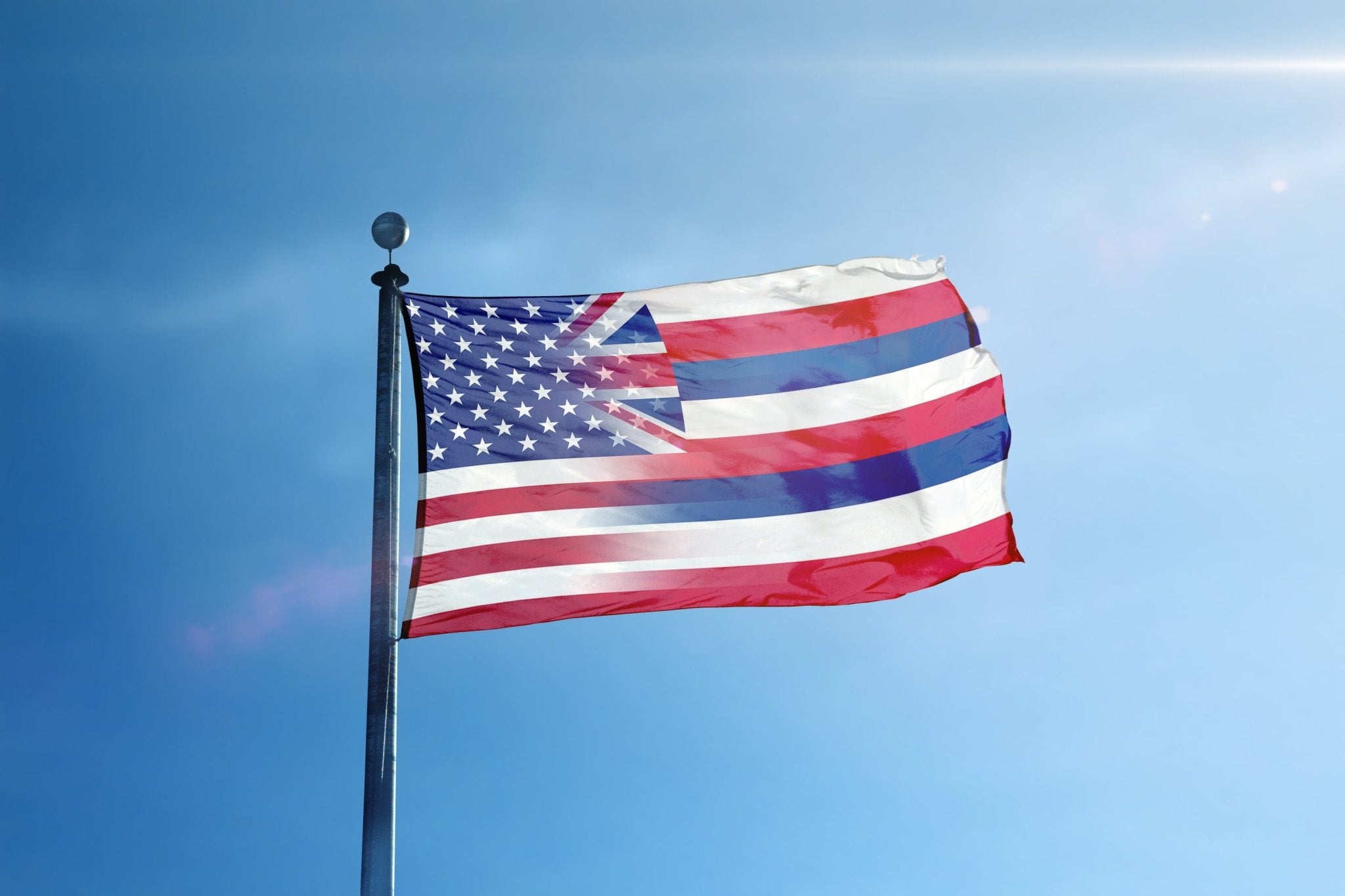 a flag flying in the wind on a sunny day