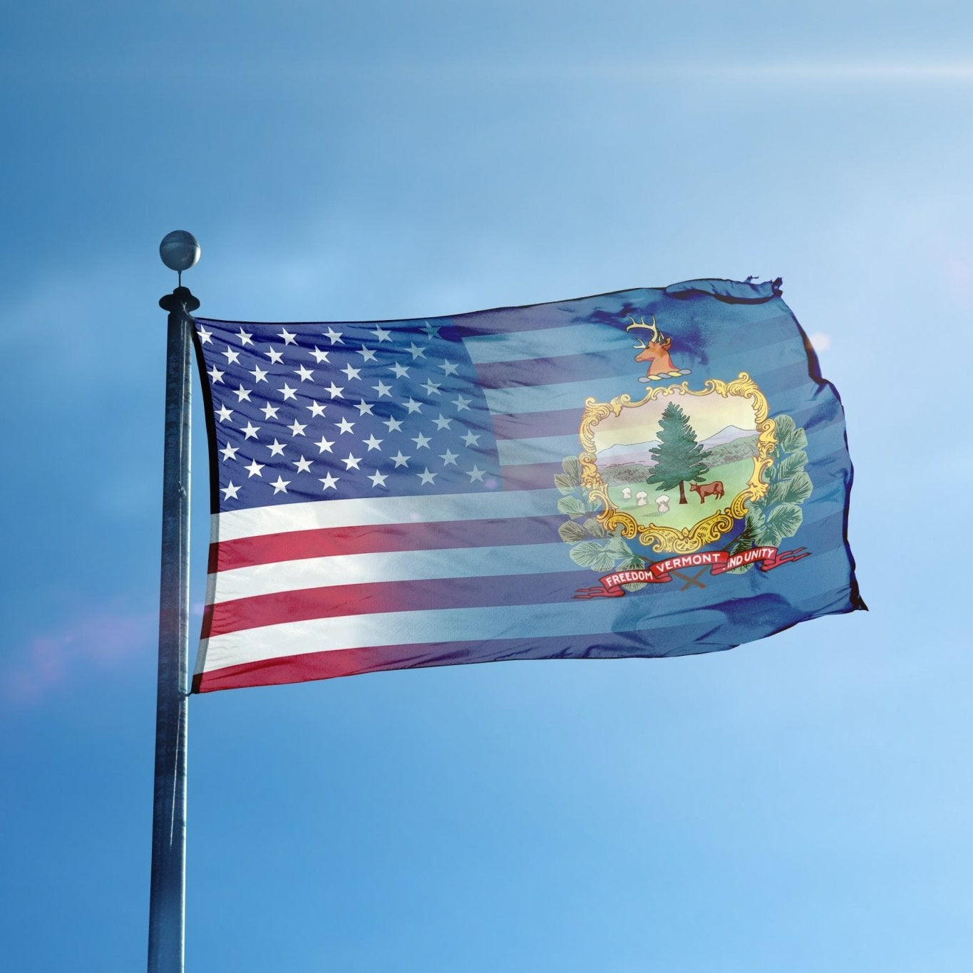 Flag of Vermont blended with the American flag flying on a flagpole.