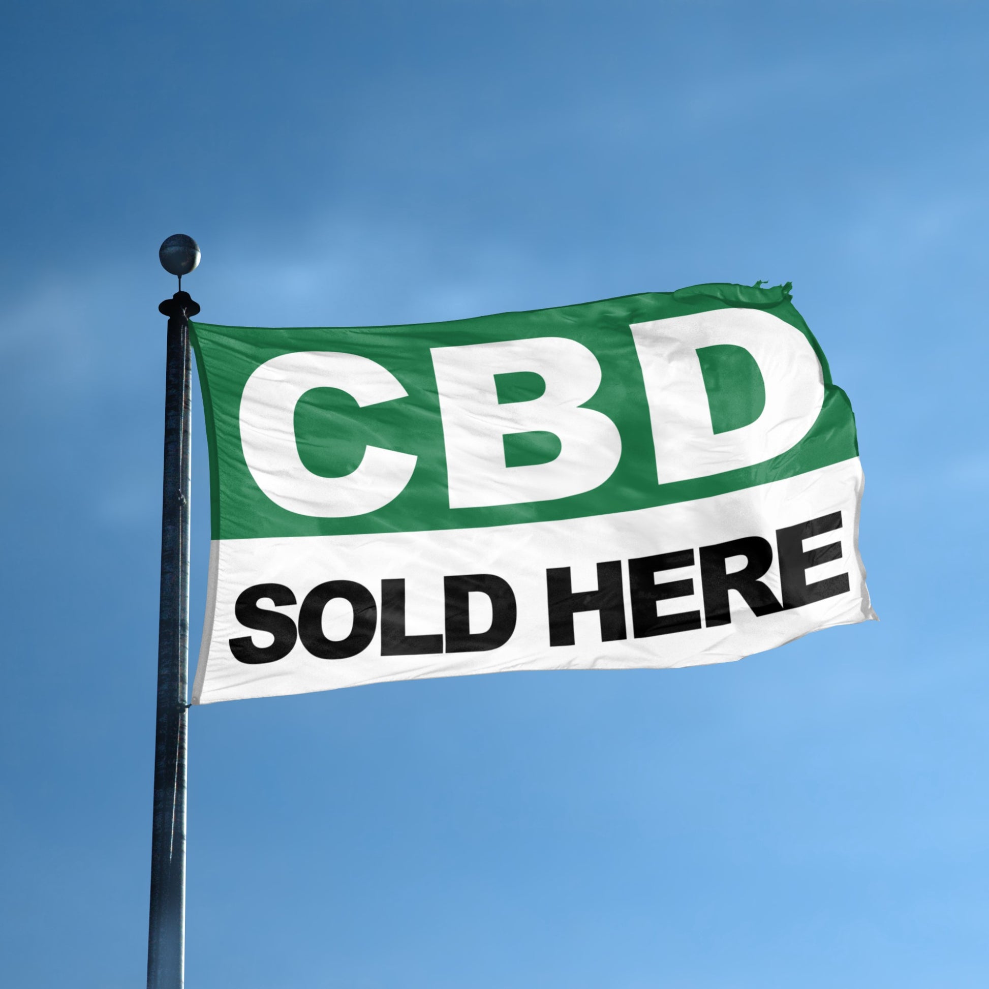 Flag with 'CBD Sold Here' text against a blue sky