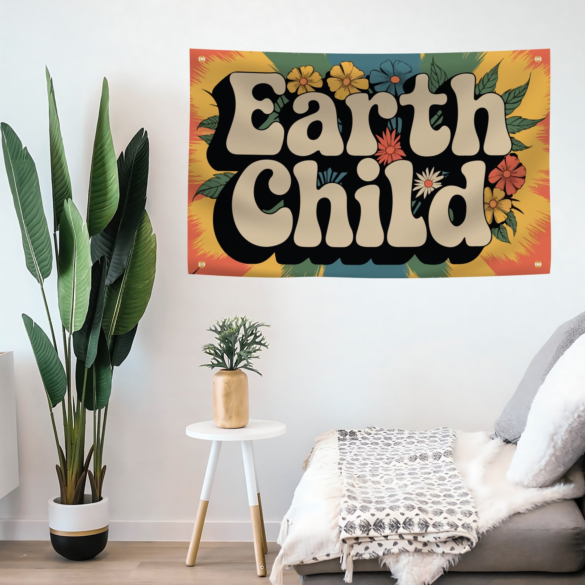 Decorative flag banner with 'Earth Child' text in a colorful design, placed above a sofa in a living room.