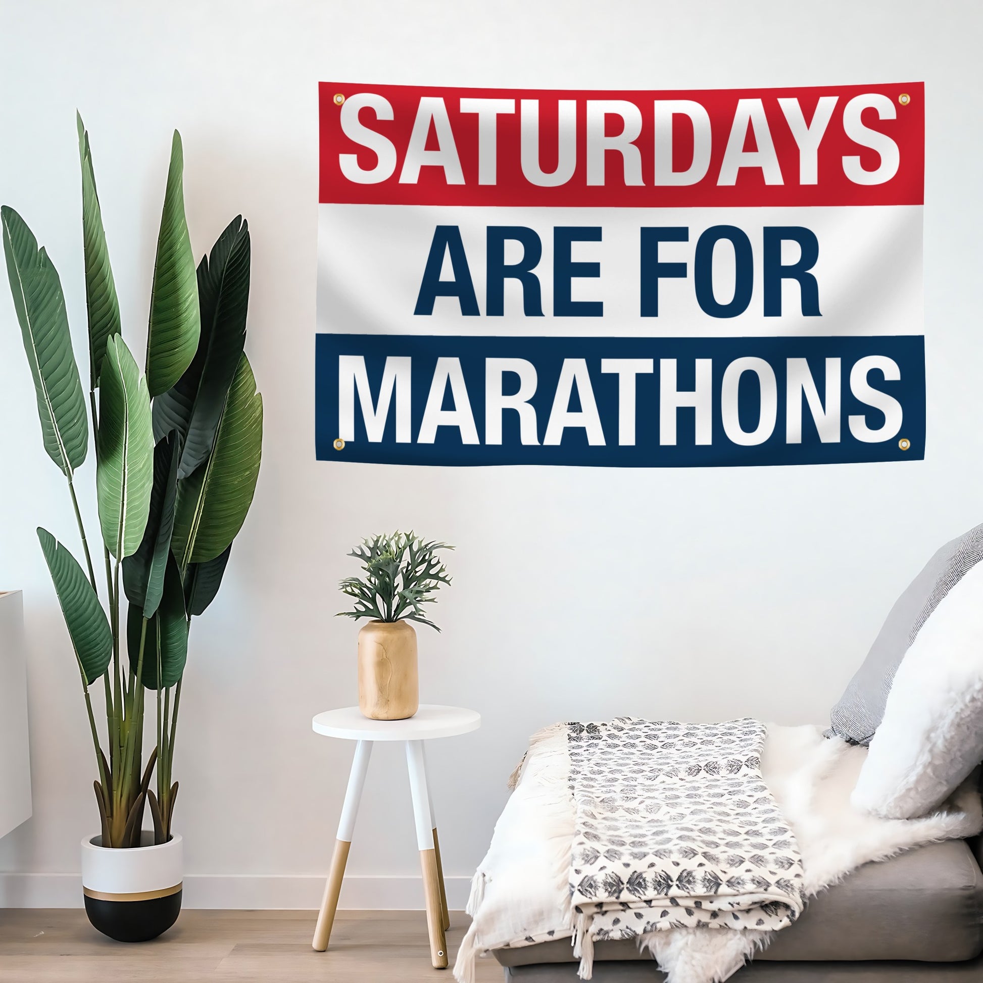 Decorative flag banner with 'Saturdays are for Marathons' text in a living room setting.