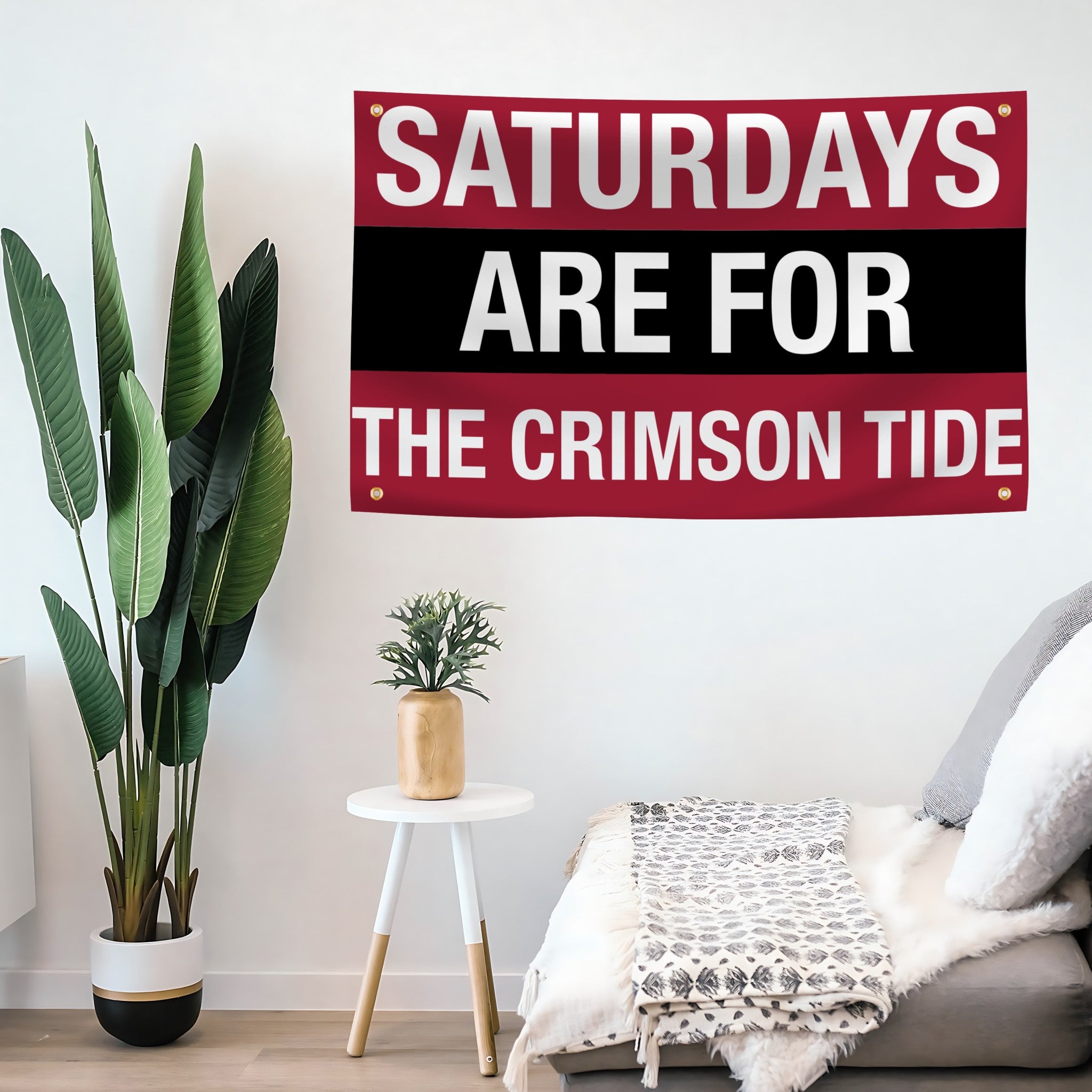 Decorative flag banner with 'Saturdays are for the Crimson Tide' text in a living room setting.