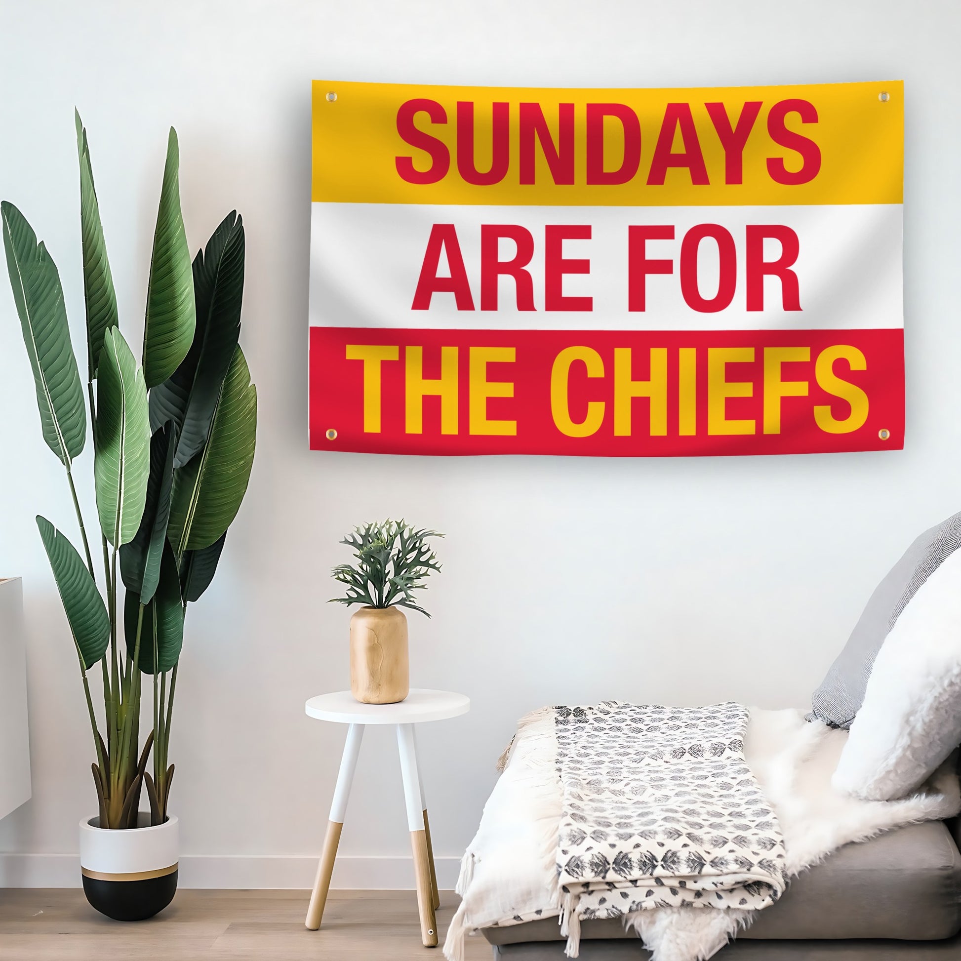 Decorative flag with 'Sundays are for the Chiefs' text in a living room setting.