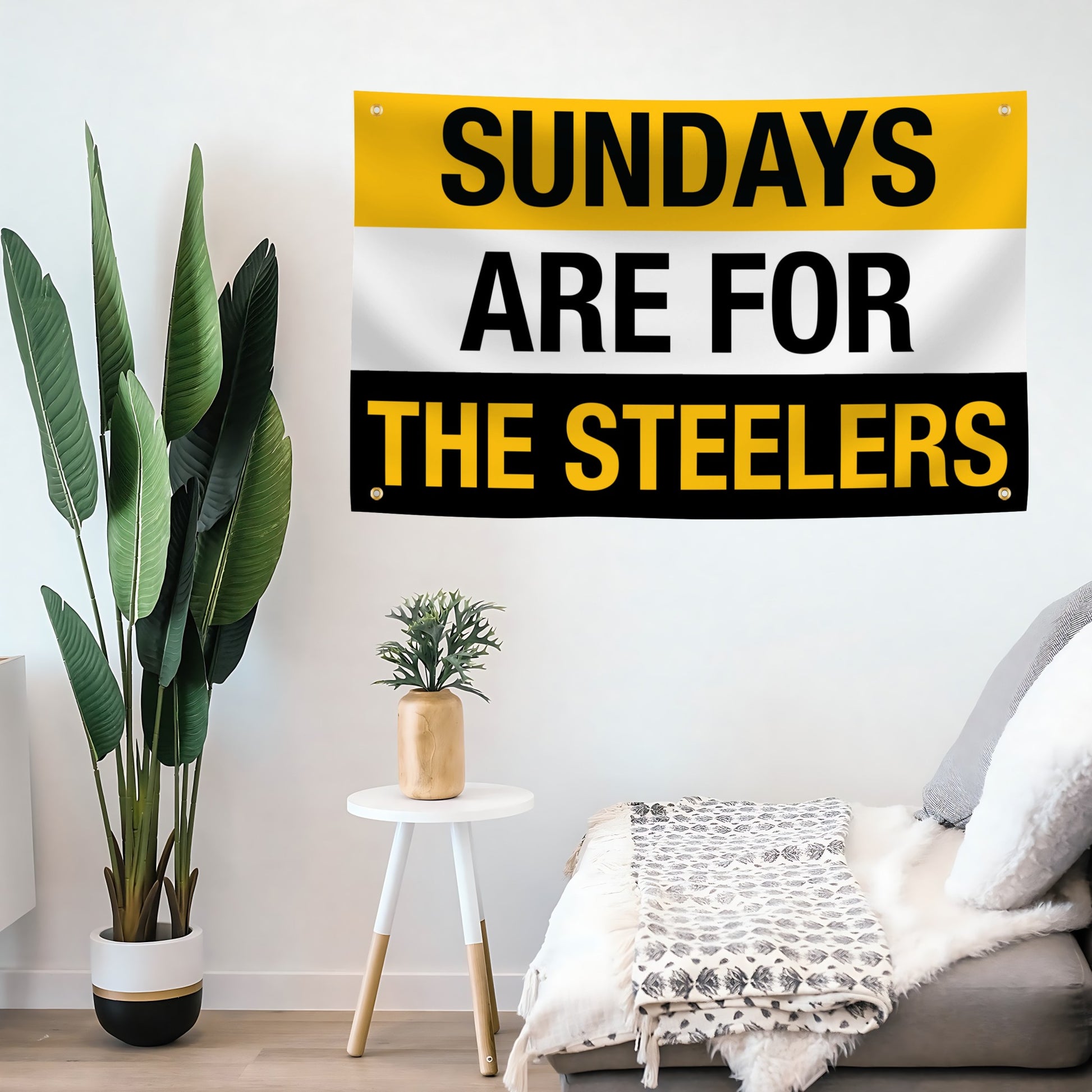 Living room with a 'Sundays are for the Steelers' banner on the wall.