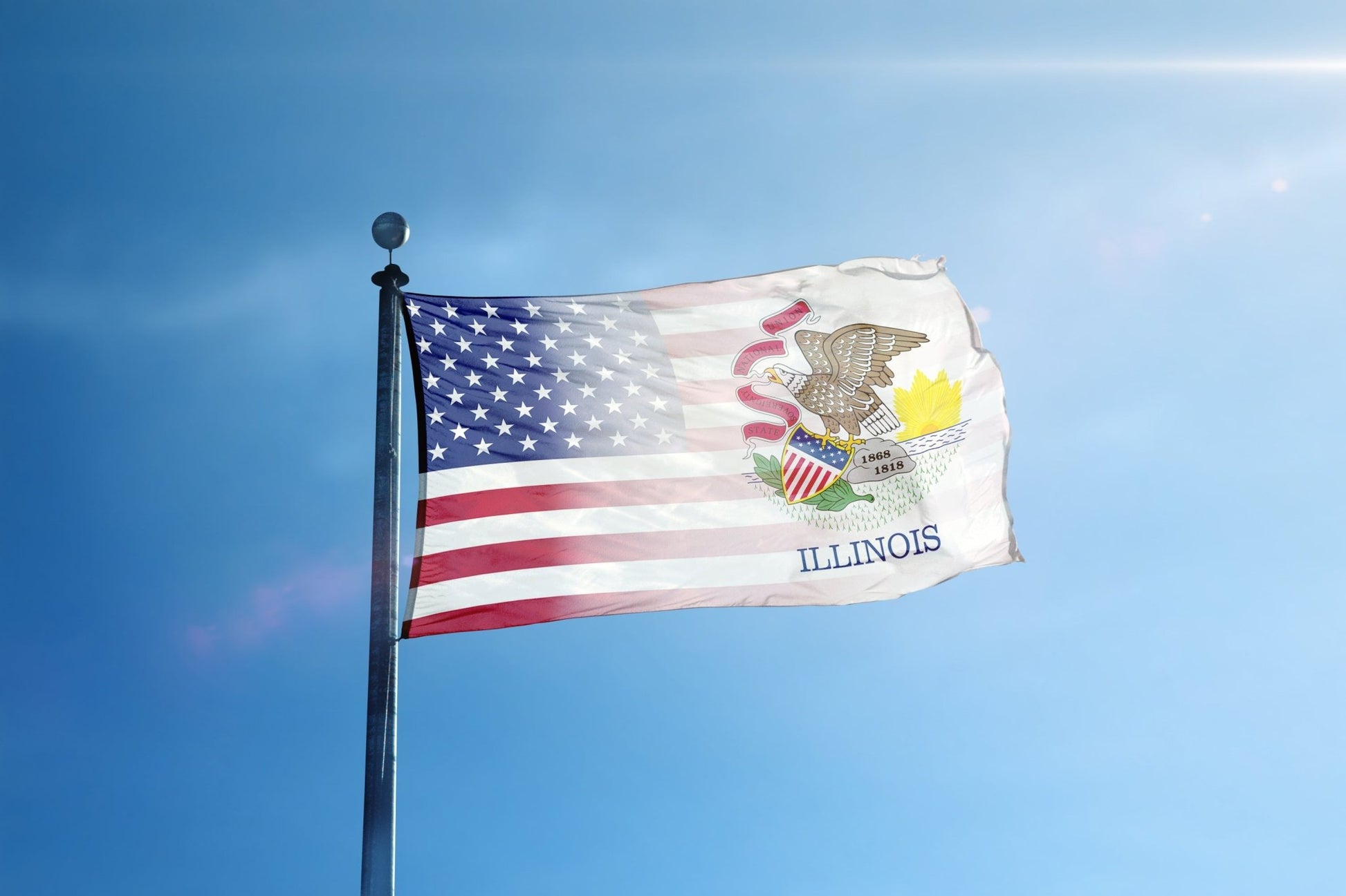 the flag of the united states of illinois flies high in the blue sky