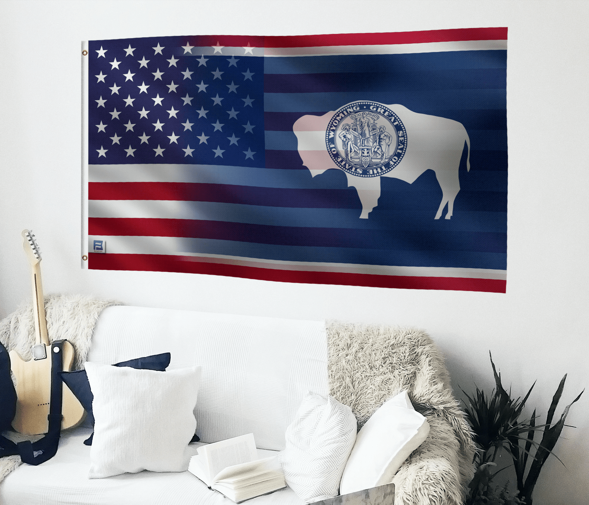 a living room with a couch, guitar, and american flag