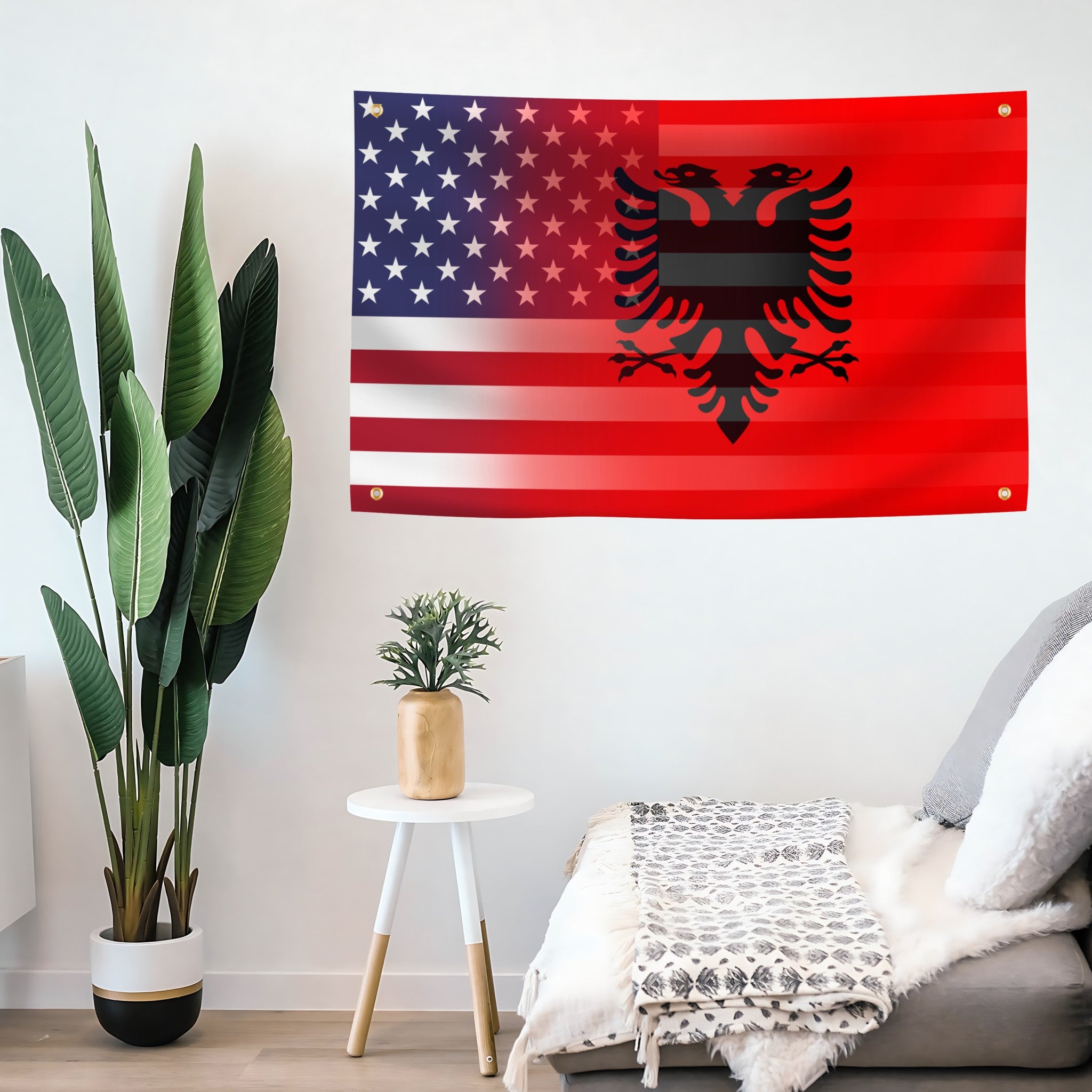 American flag banner with Albanian emblem on a wall in a living room.