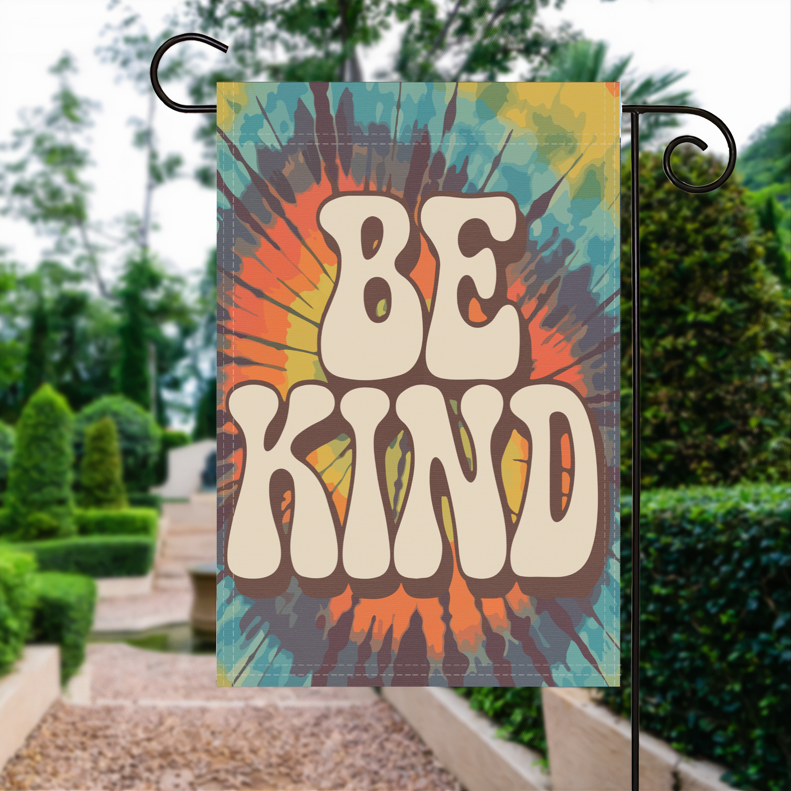 Be Kind garden flag made of weatherproof polyester displayed in a garden | Bannerfi