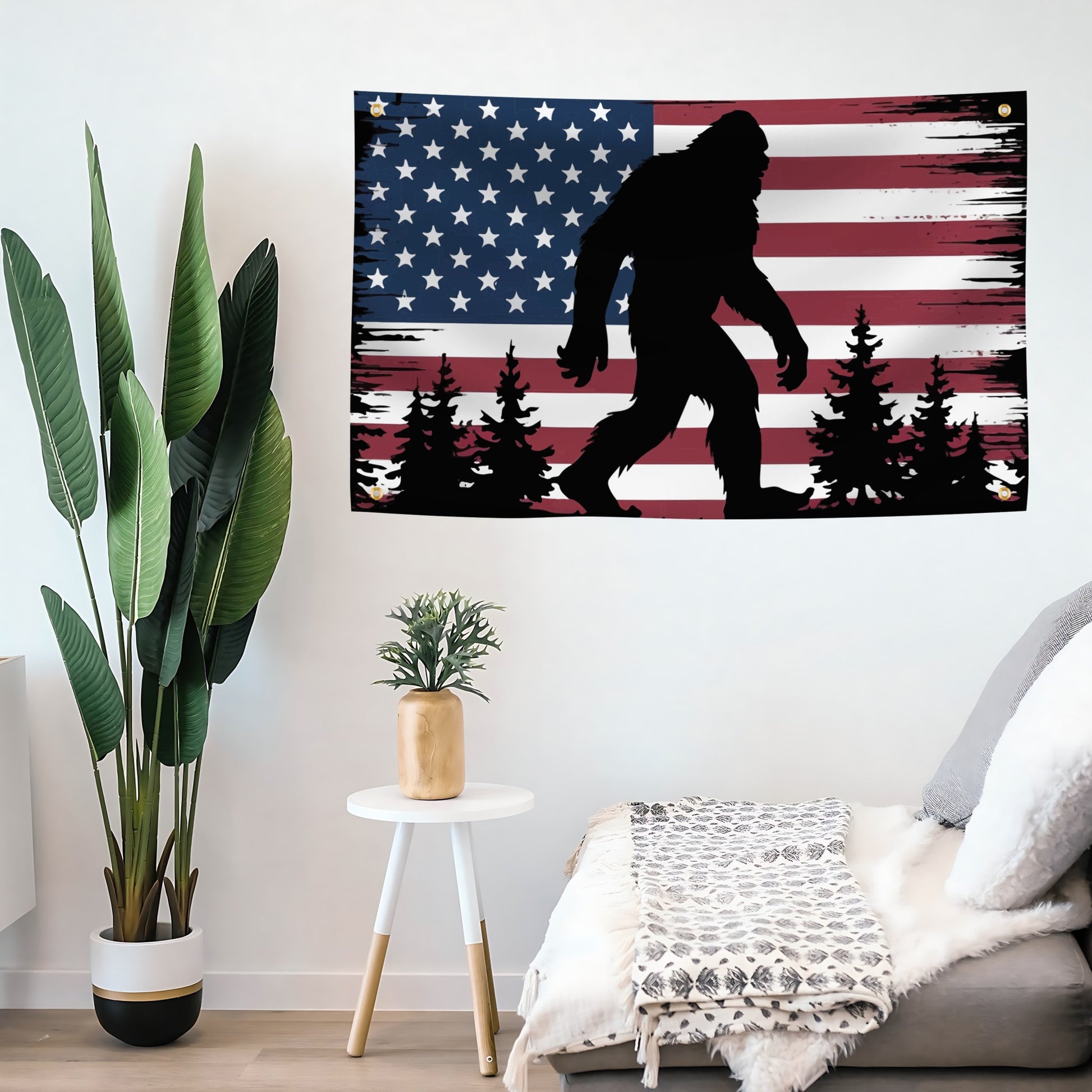 American flag banner with a silhouette of a bigfoot in a room with a plant and a small table.