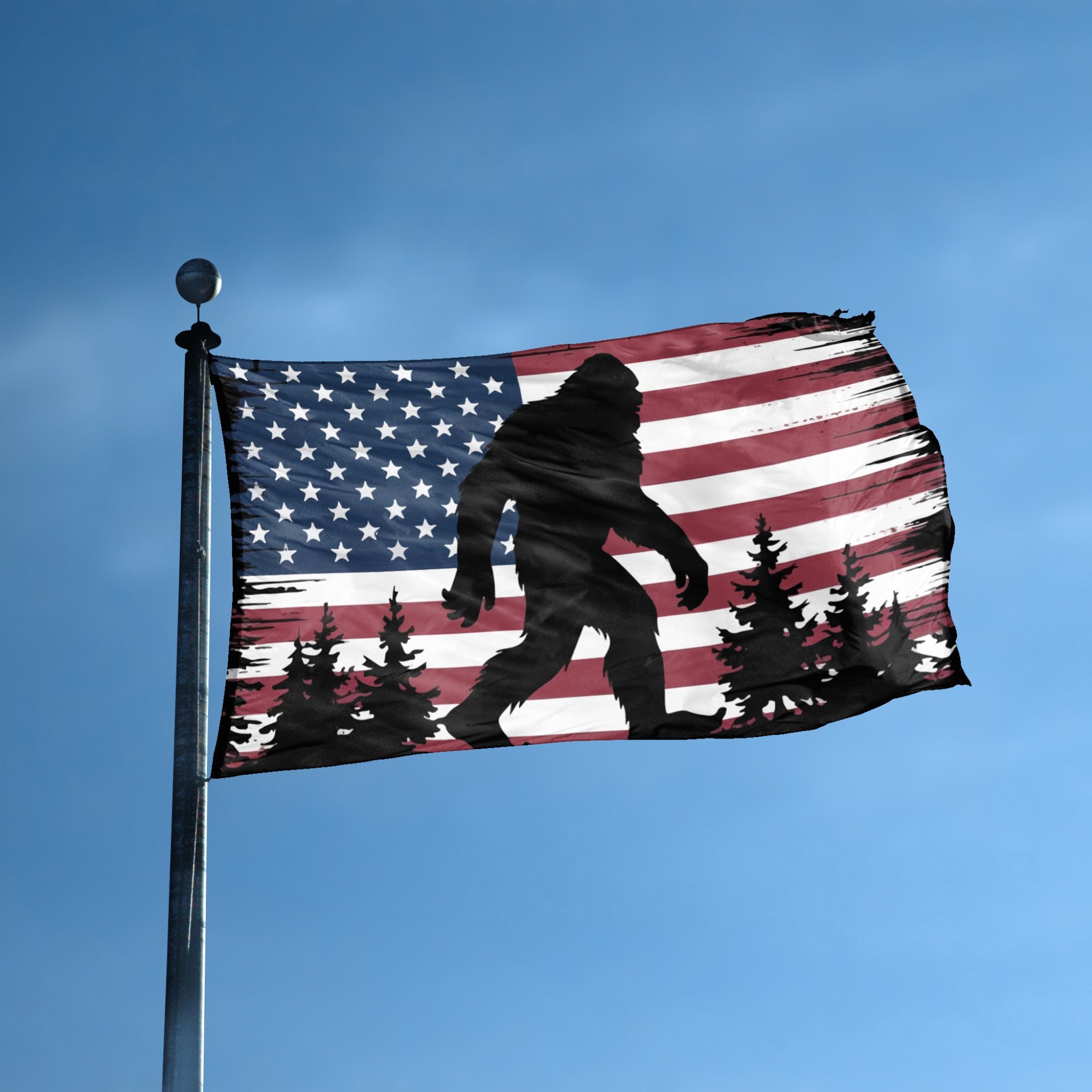 A flag with the theme "Bigfoot American" displayed on a tall flag pole and blue skies.