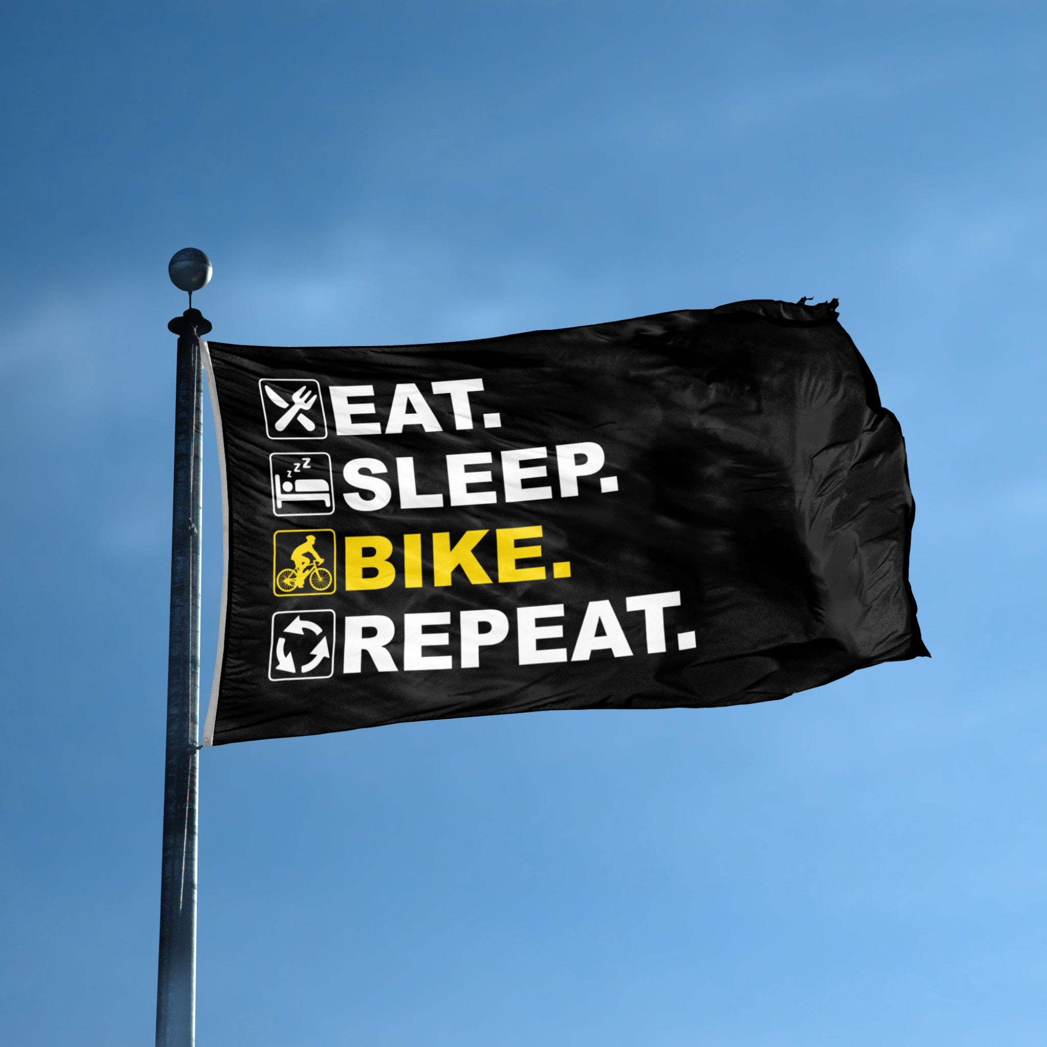 Black flag with 'Eat. Sleep. Bike. Repeat.' text and symbols against a blue sky.