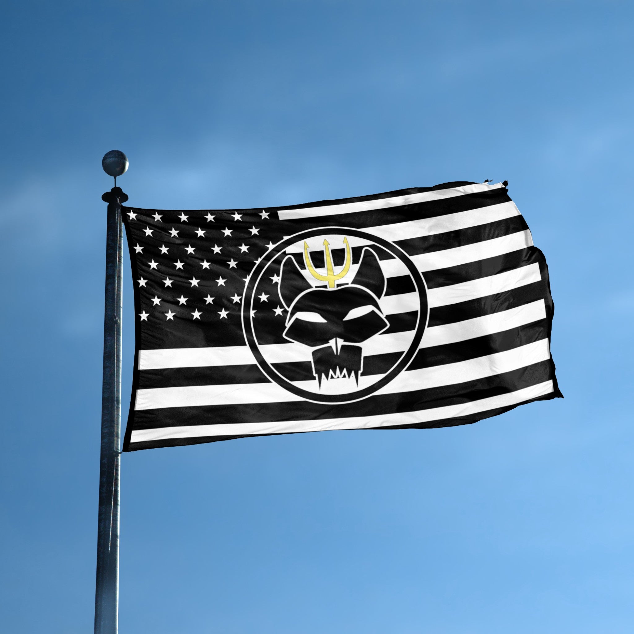 SEAL Team Bravo flag with black emblem design and American flag pattern against a blue sky