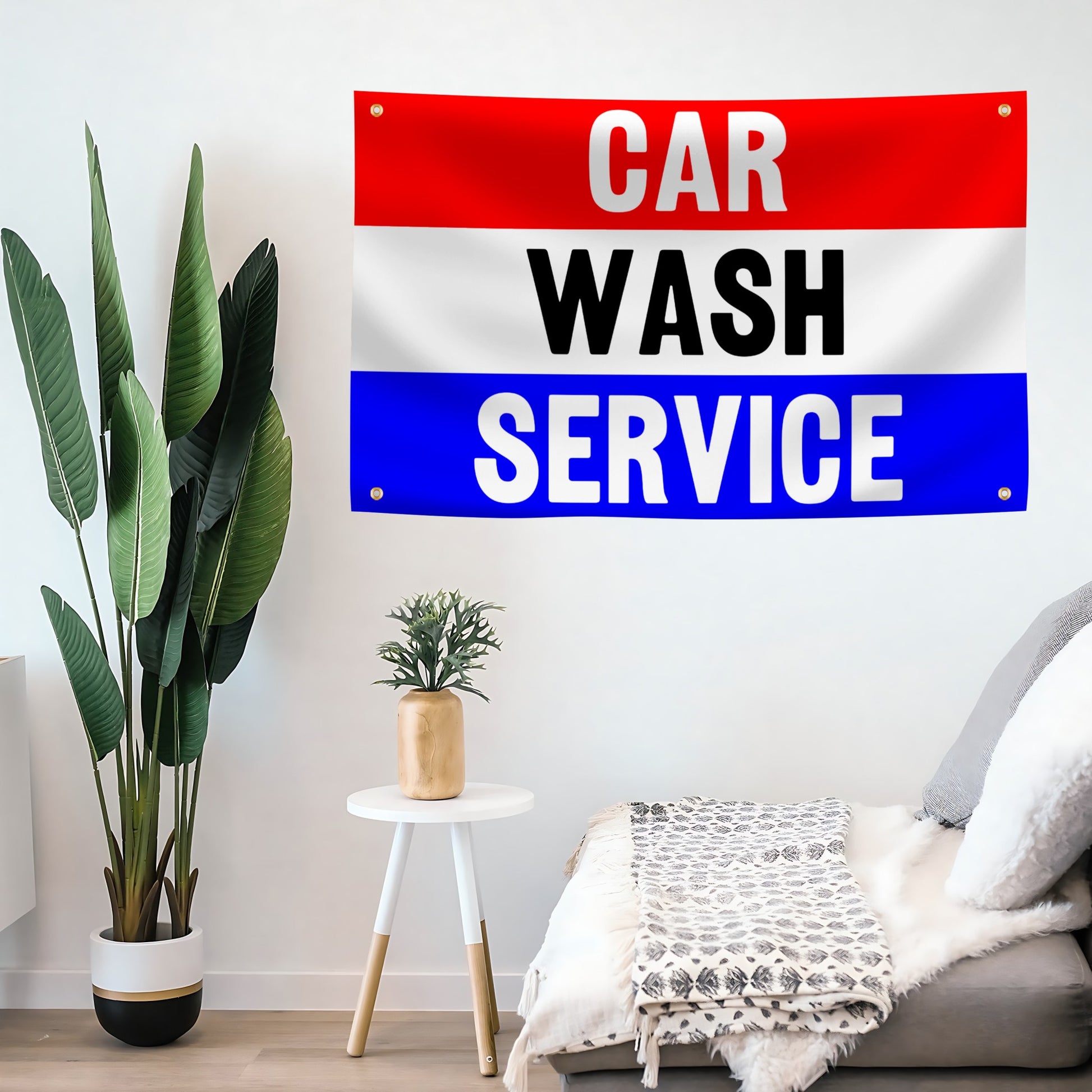 A banner with horizontal red, white, and blue stripes, with the words 'CAR WASH SERVICE' in bold letters mounted on a wall.