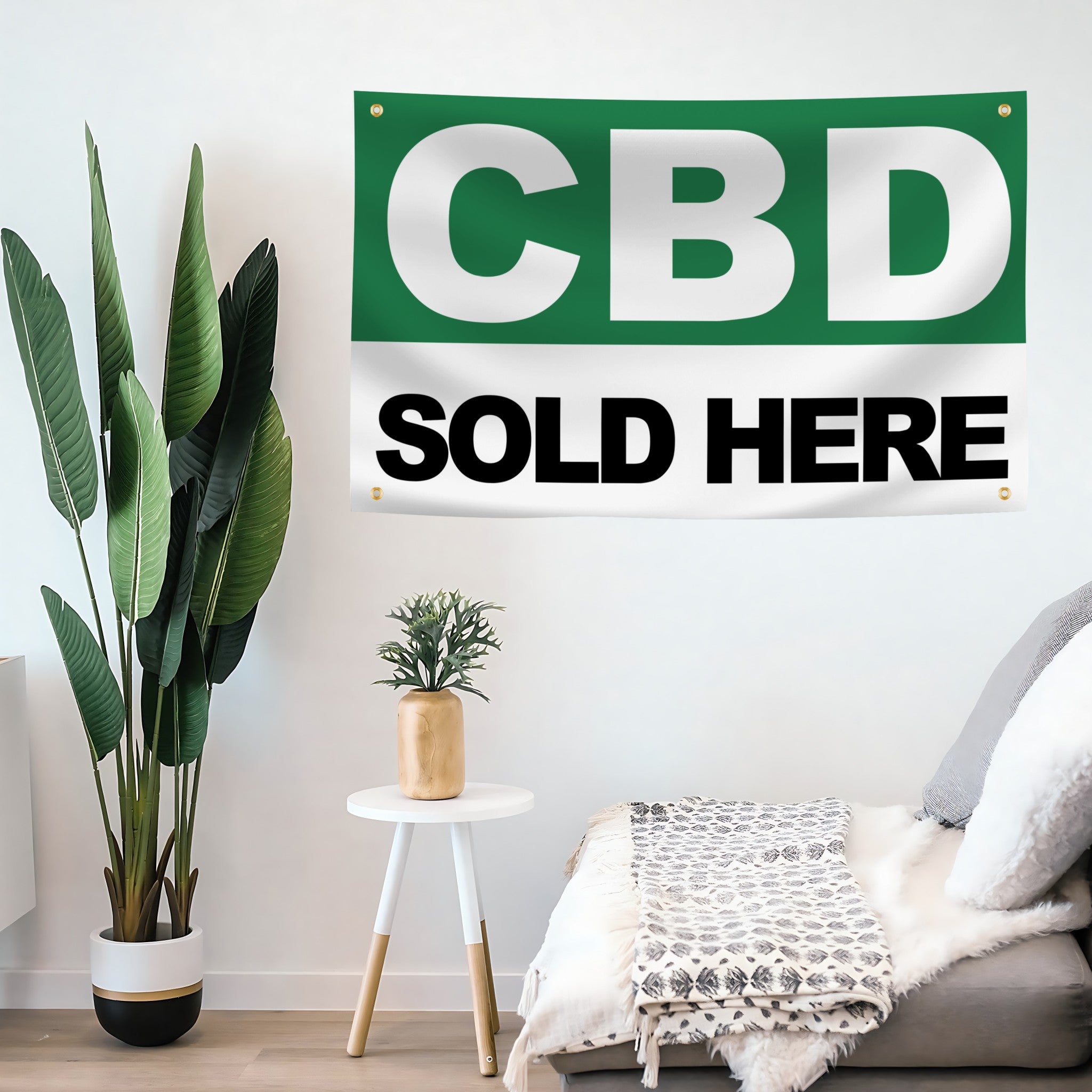 Room interior with 'CBD Sold Here' sign on the wall