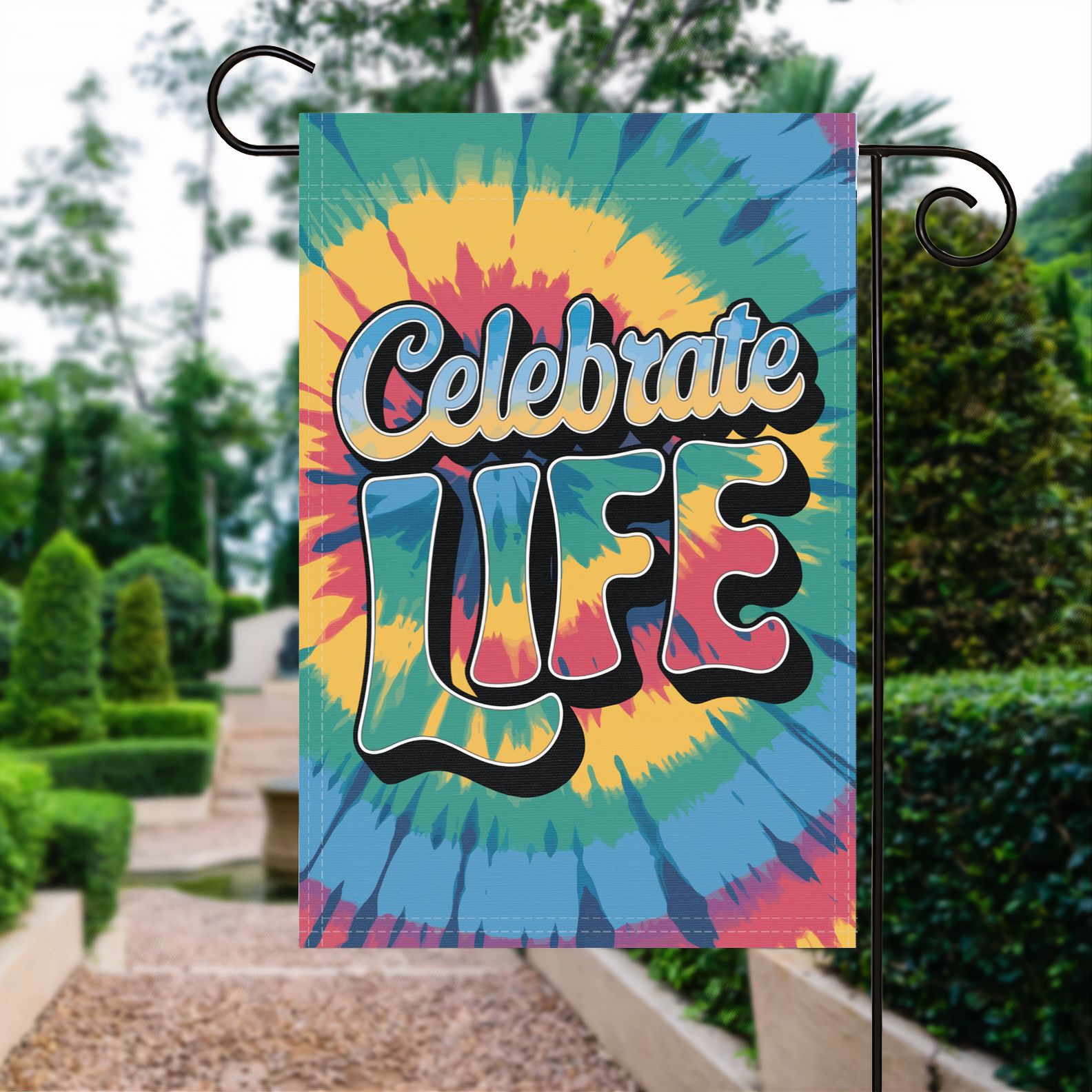 Celebrate Life garden flag made of weatherproof polyester displayed in a garden | Bannerfi