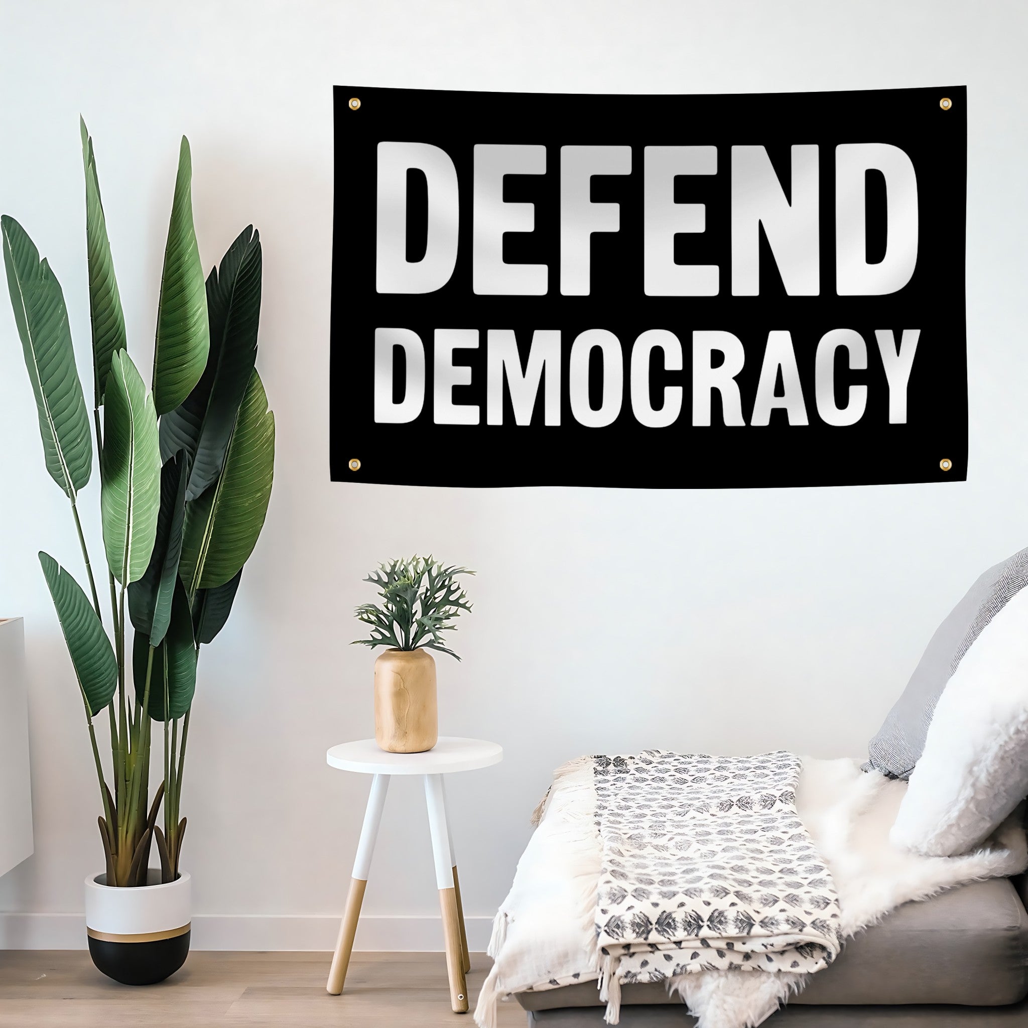 Banner with 'DEFEND DEMOCRACY' text in a room with plants and furniture.