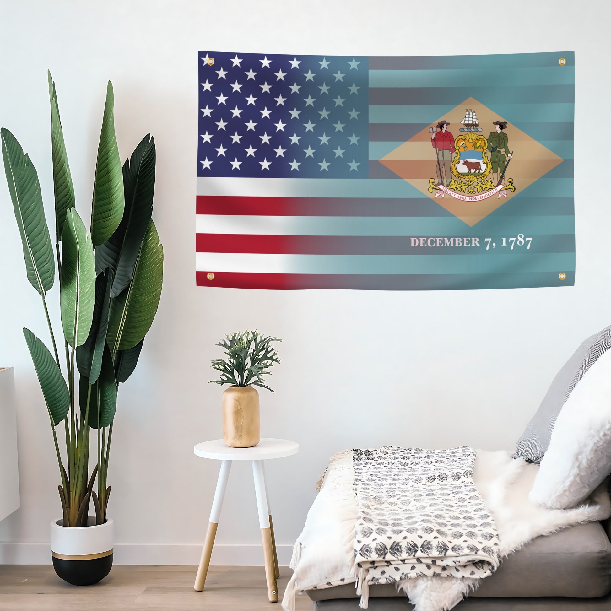 Living room with a large flag banner featuring an American flag and state emblem, alongside a plant and small table.