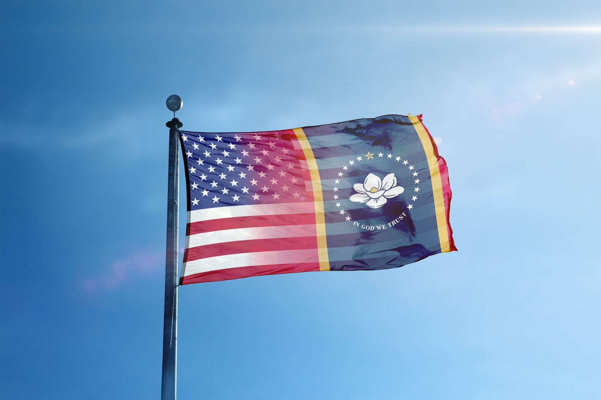 a flag flying in the wind with a blue sky in the background