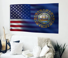 Load image into Gallery viewer, a living room with a couch and a flag hanging on the wall
