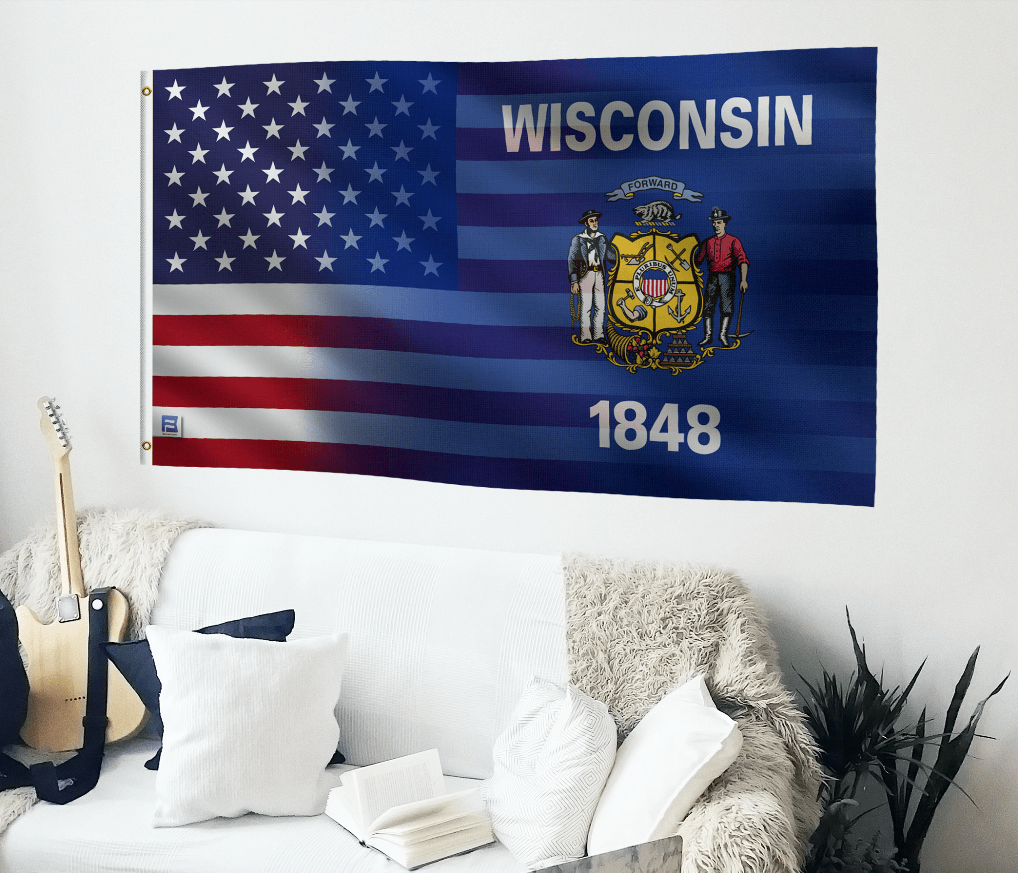 a living room with a couch and a flag hanging on the wall