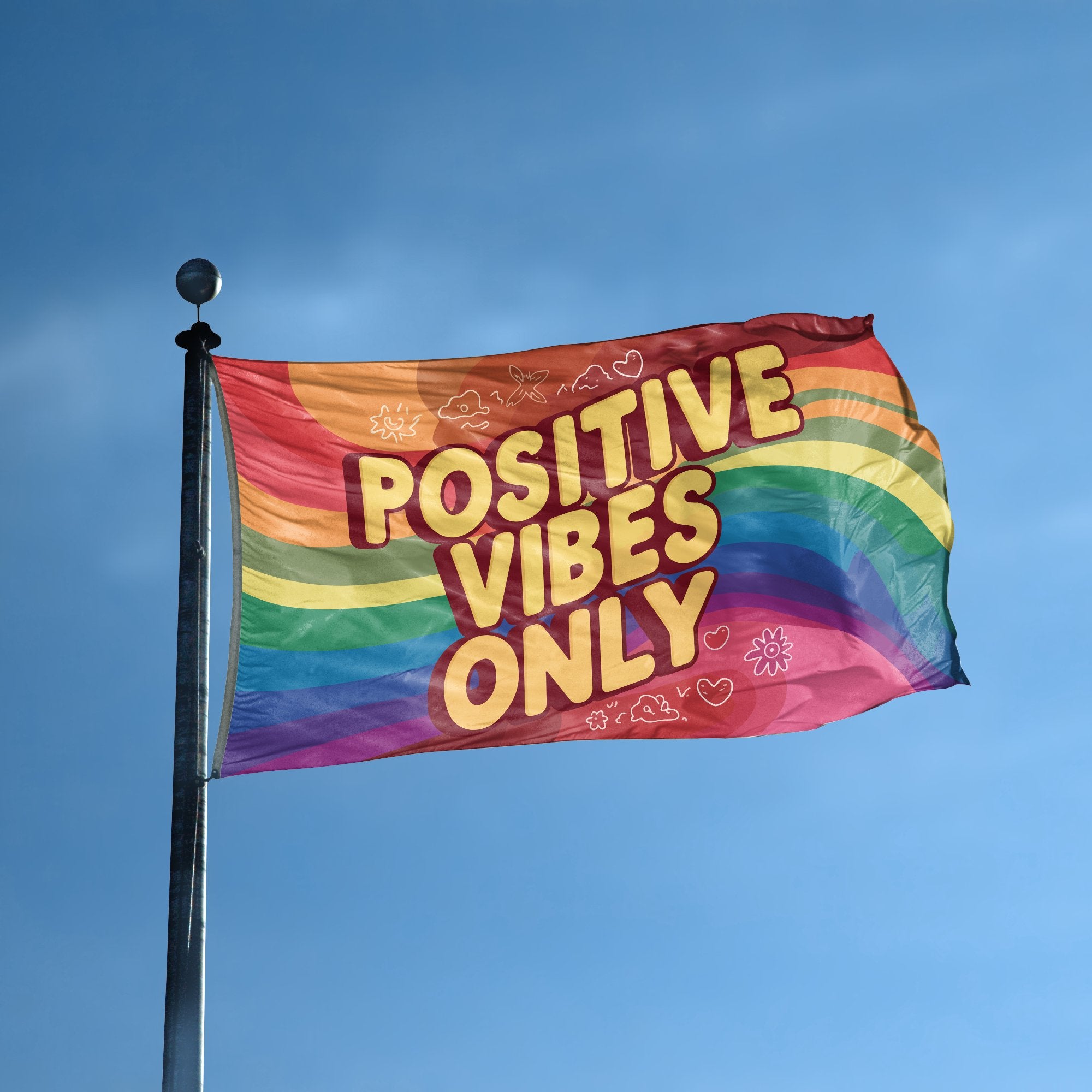 A flag with the saying "Positive Vibes Only" displayed on a high pole, with a special occasion color scheme.