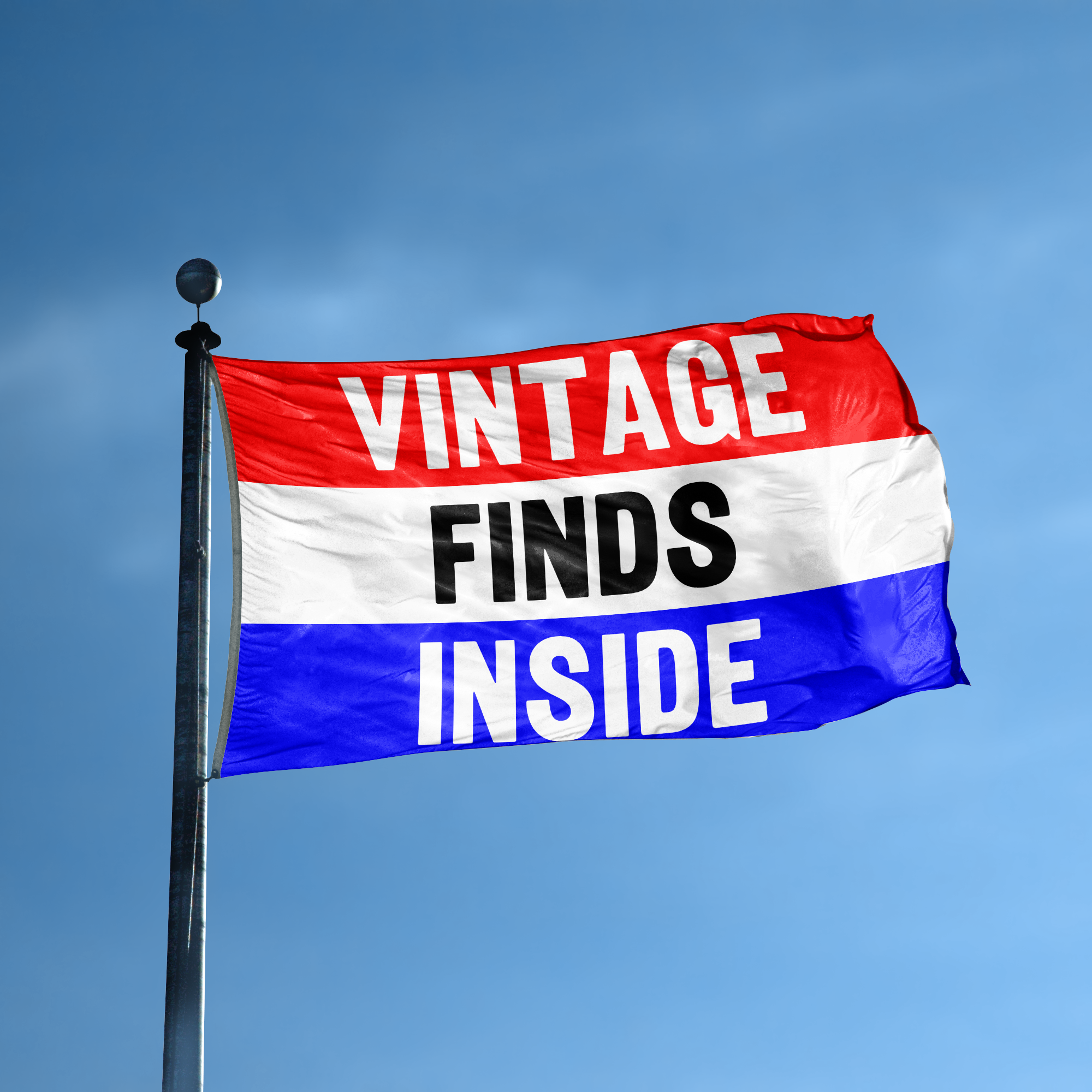 A business banner with the saying "Vintage Finds Inside" displayed on a high pole, with a red, white, and blue color scheme.