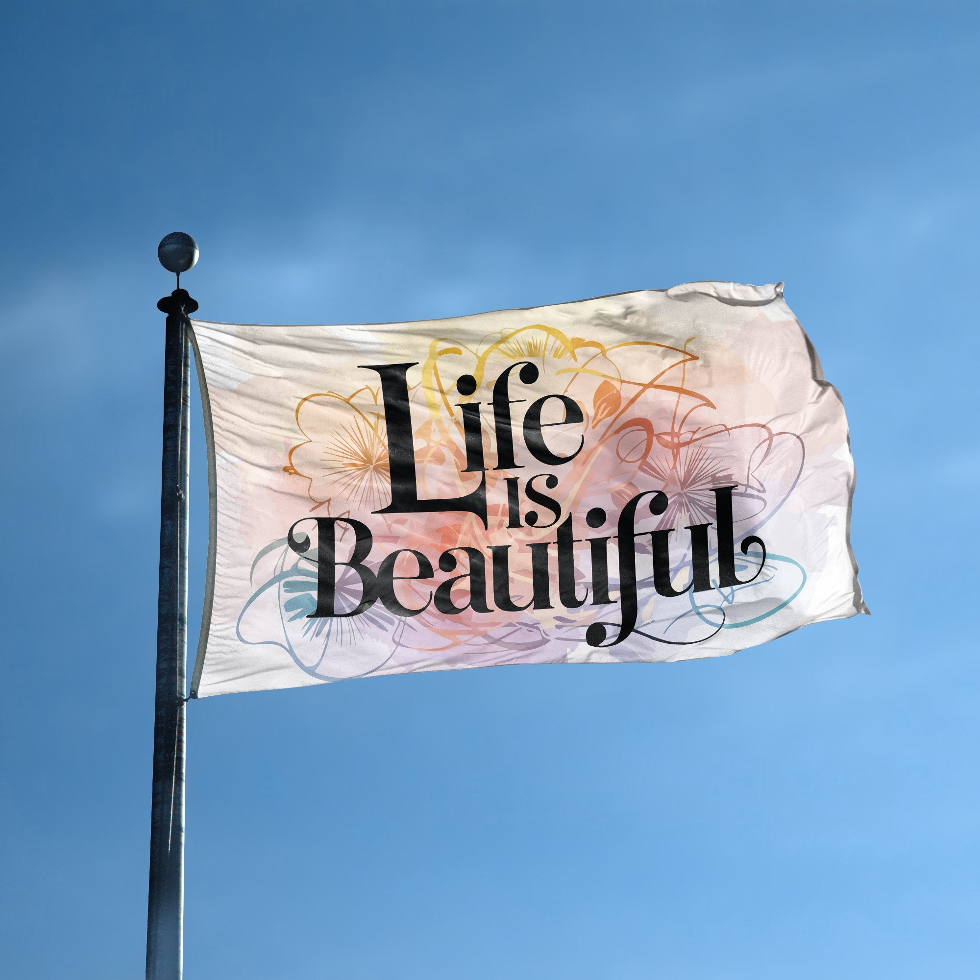 A flag with the saying "Life Is Beautiful" displayed on a high pole, with a special occasion color scheme.