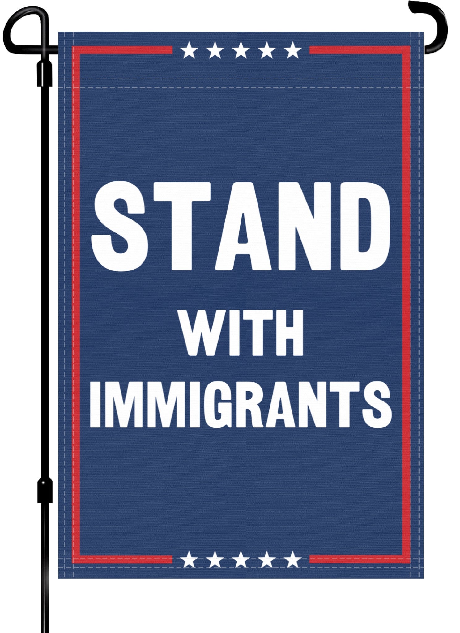 A red, white and blue political garden flag on a pole with the slogan Stand With Immigrants. 