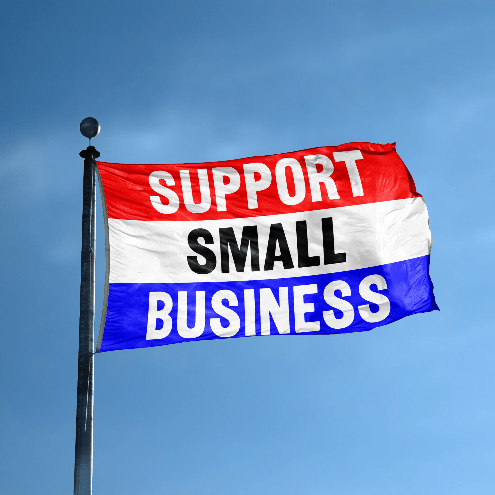 A business banner with the saying "Support Small Business" displayed on a high pole, with a red, white, and blue color scheme.