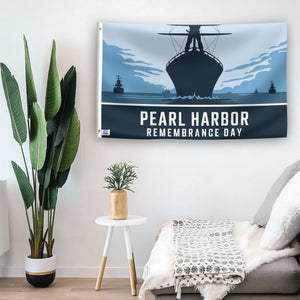 In a home setting, a flag with the saying "Pearl Harbor Remembrance Day" is mounted on a white wall by a side table.