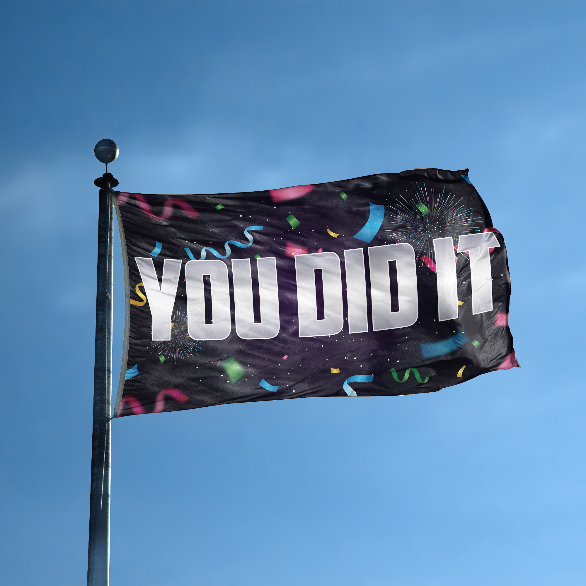 A flag with the saying "You Did It" displayed on a high pole, with a special occasion color scheme.