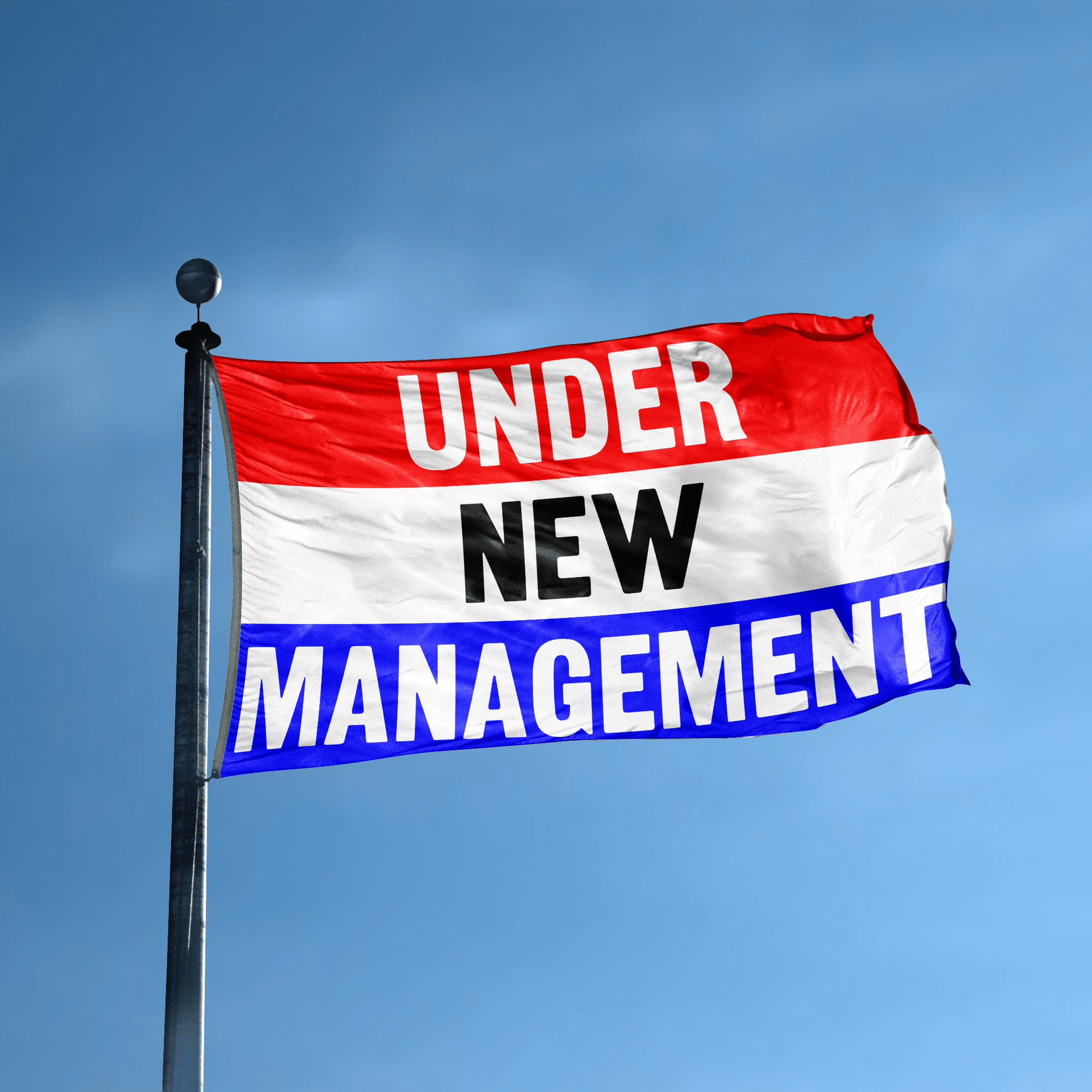 A business banner with the saying "Under New Management" displayed on a high pole, with a red, white, and blue color scheme.