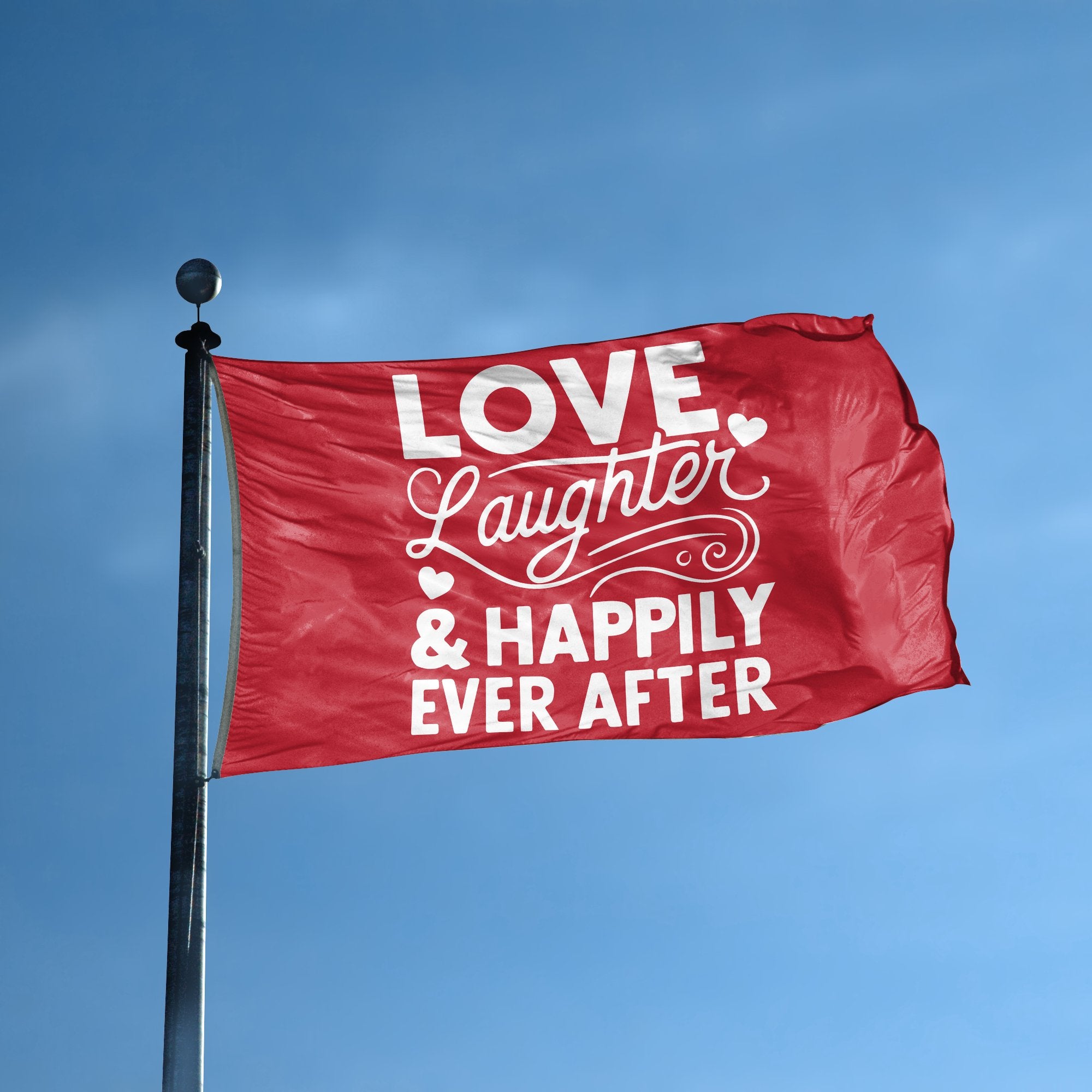 A flag with the saying "Love Laughter & Happily Ever After Wedding" displayed on a high pole, with a special occasion color scheme.