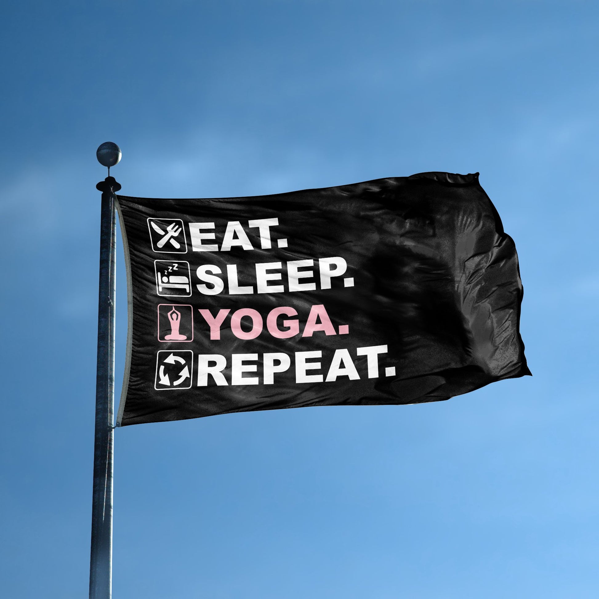 A flag with the saying "Eat Sleep Yoga Repeat" displayed on a high pole, with a black, white and themed color scheme.