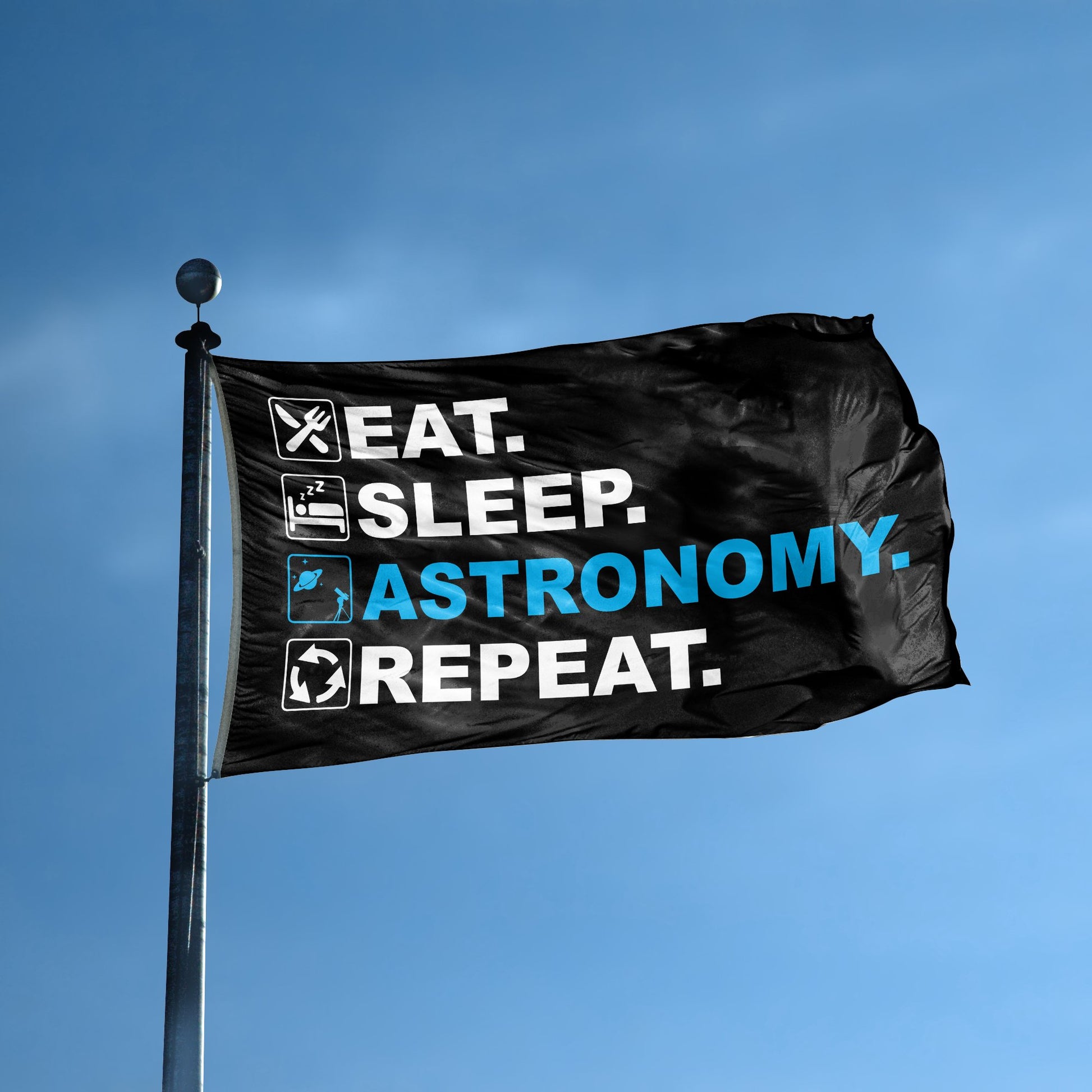 A flag with the saying "Eat Sleep Astronomy Repeat" displayed on a high pole, with a black, white and themed color scheme.