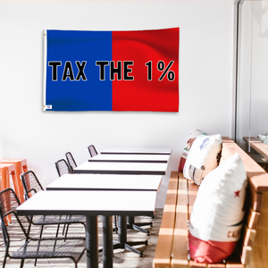 A political flag in royal blue and crimson red with a political statement on a wall in a cafe setting.