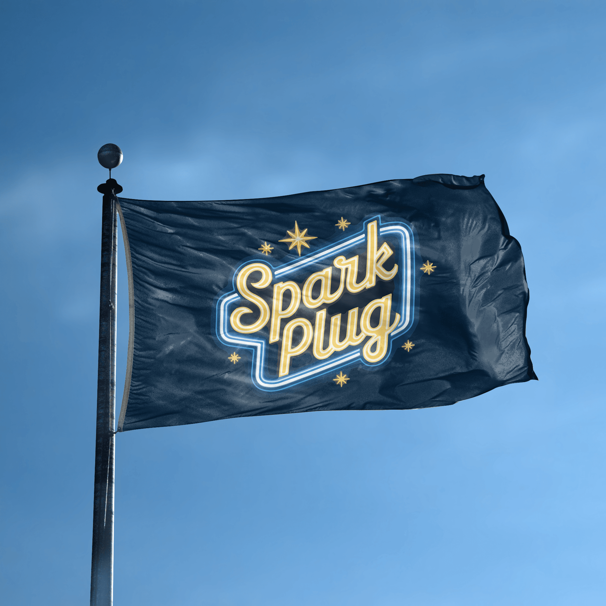 A flag with the saying "Spark Plug" displayed on a high pole, with a neon style color scheme.